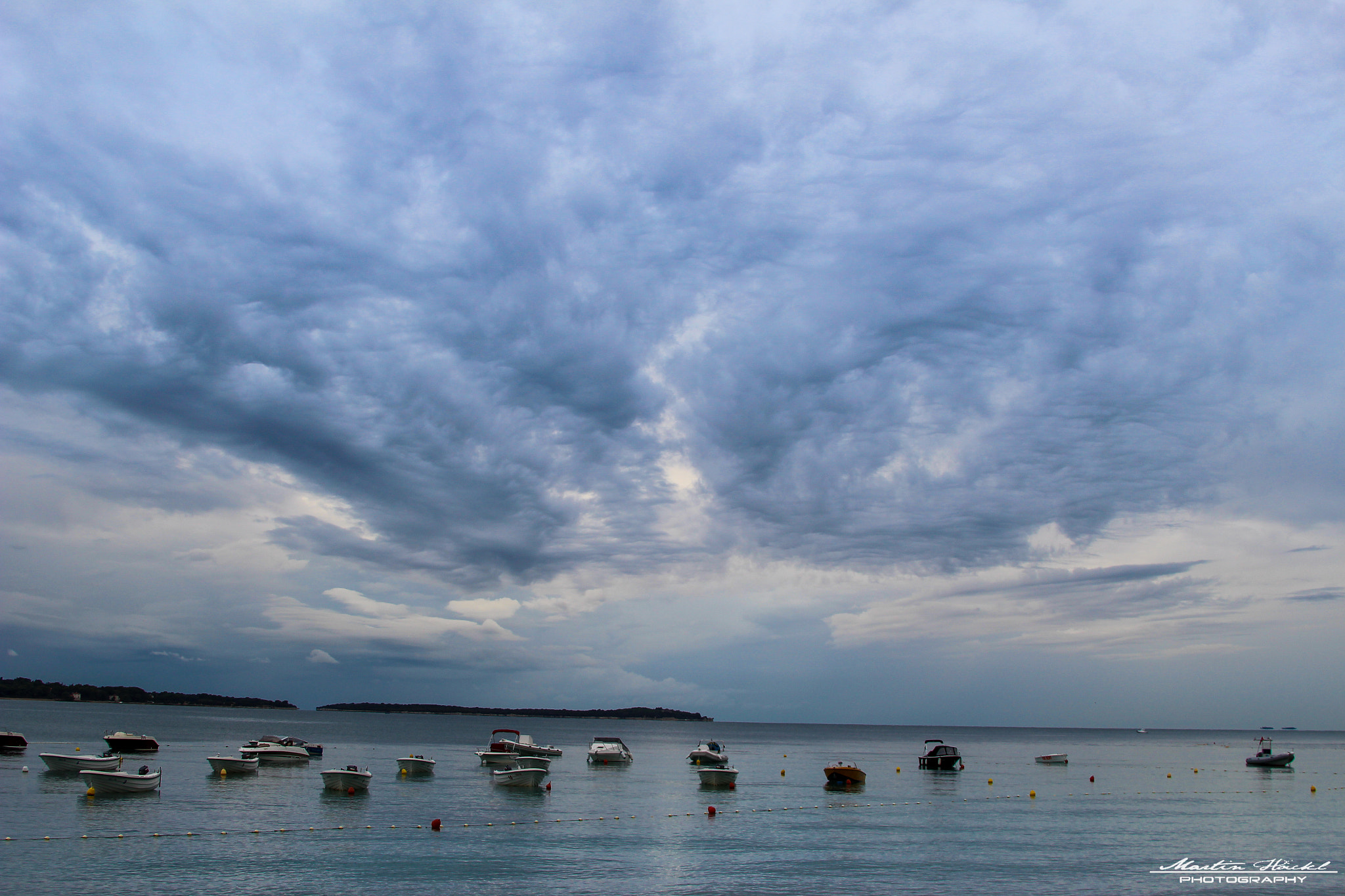 Canon EF 28-135mm F3.5-5.6 IS USM sample photo. Clouds over sea photography