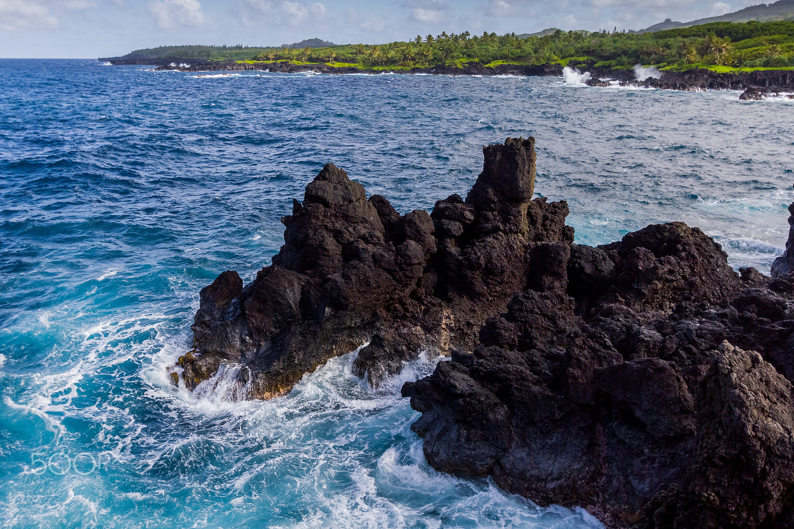 Canon EF-S 10-22mm F3.5-4.5 USM sample photo. Volcanic stone meets ocean photography