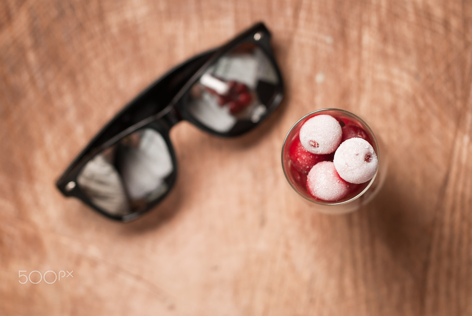 Nikon D80 + AF Nikkor 50mm f/1.8 N sample photo. Frozen cherries in the glasses and sunglasses on a wooden table photography