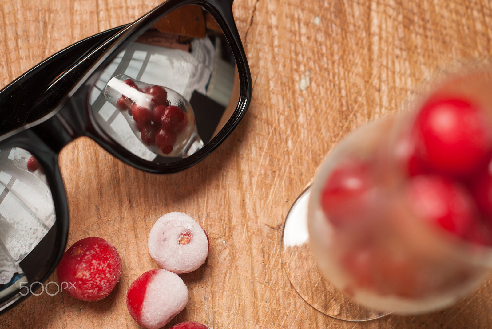 Nikon D80 + AF Nikkor 50mm f/1.8 N sample photo. Frozen cherries in the glasses and sunglasses on a wooden table photography