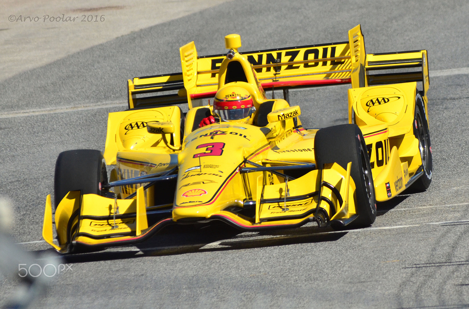 Nikon D7000 + AF-S Zoom-Nikkor 24-85mm f/3.5-4.5G IF-ED sample photo. Helio castroneves racing at the toronto indy photography