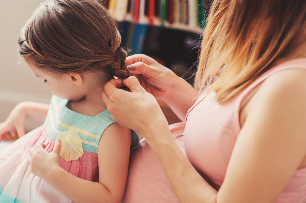 mother brushing toddler daughter at home by Maria Kovalevskaya on 500px.com