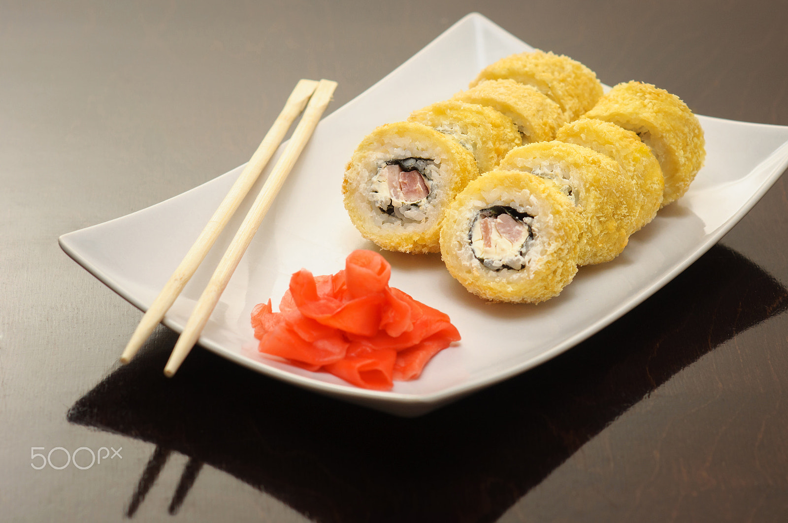 Nikon D90 + Nikon AF Nikkor 85mm F1.8D sample photo. Chicken sushi roll on the plat with chopsticks photography