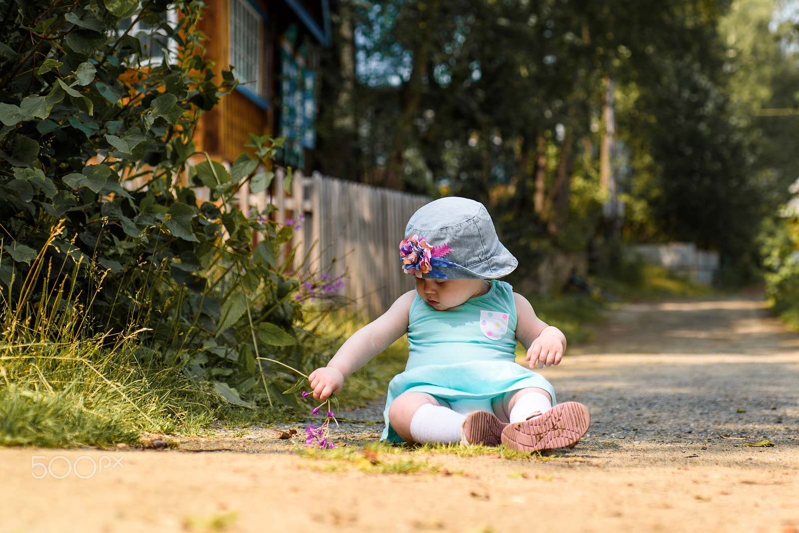 Nikon D750 + AF Micro-Nikkor 60mm f/2.8 sample photo. Portrait of sad little girl sitting on road at the day time photography