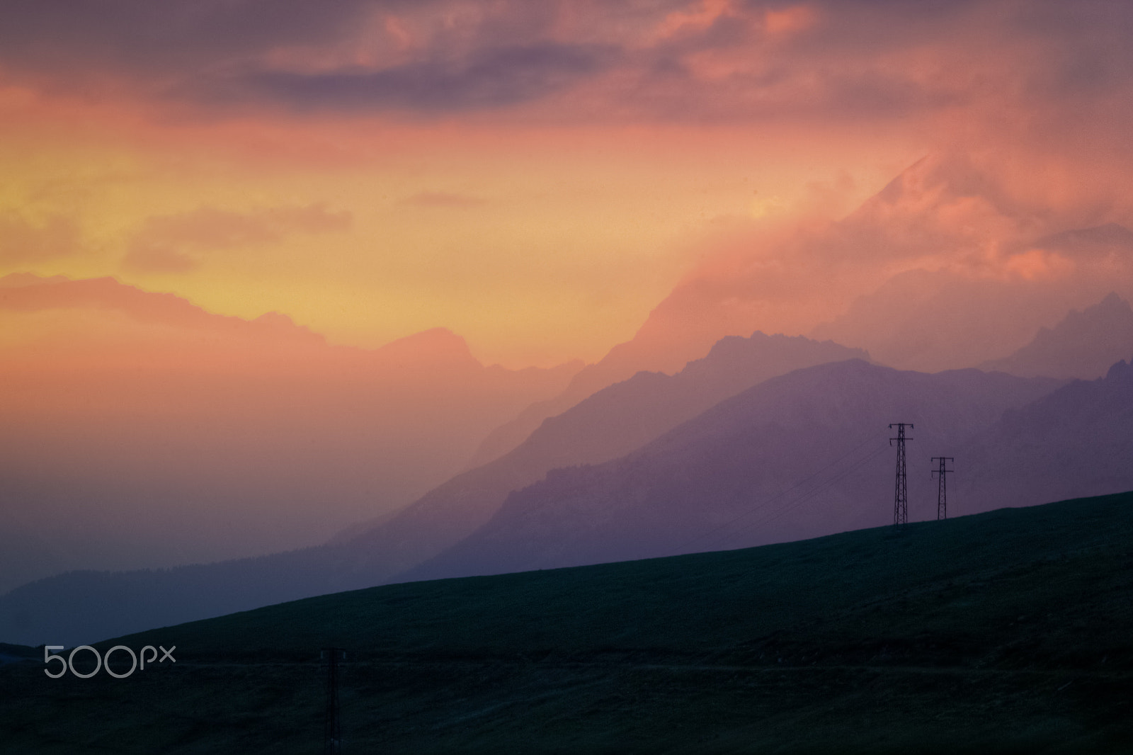 Canon EOS 600D (Rebel EOS T3i / EOS Kiss X5) + Canon EF 100mm F2.8 Macro USM sample photo. Orange / purple sunset from the alps photography