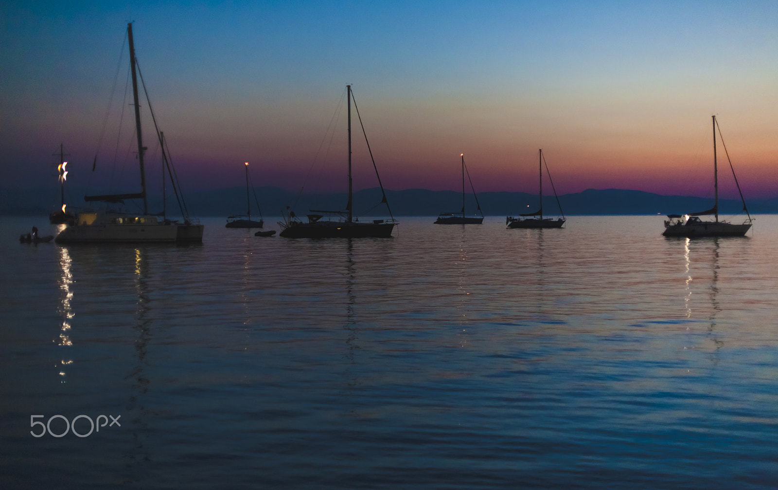 Canon EOS 5D + Canon EF 28-70mm f/3.5-4.5 sample photo. Boats at night photography