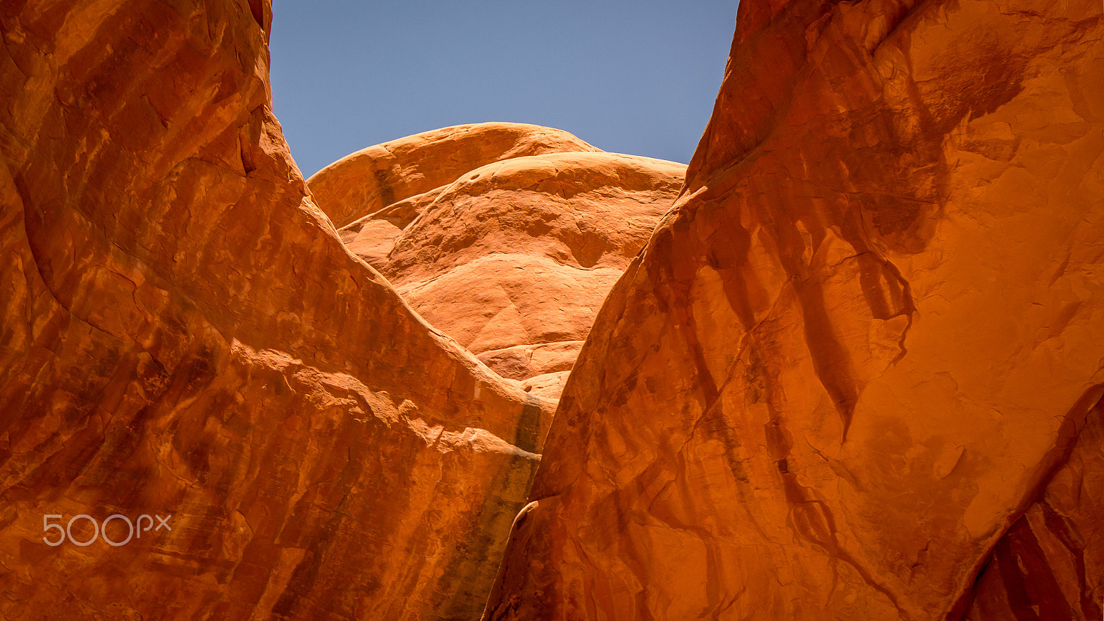 Sony Alpha NEX-5R + Sony E 55-210mm F4.5-6.3 OSS sample photo. Rocks in arches national park photography