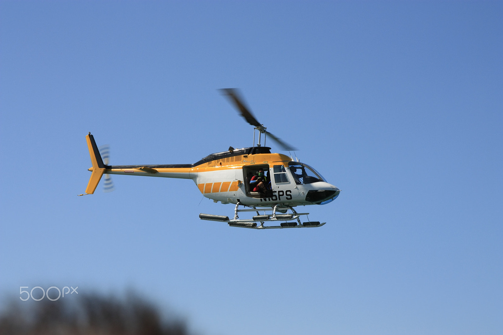 Canon EOS 450D (EOS Rebel XSi / EOS Kiss X2) sample photo. Helicopter with diver on board photography