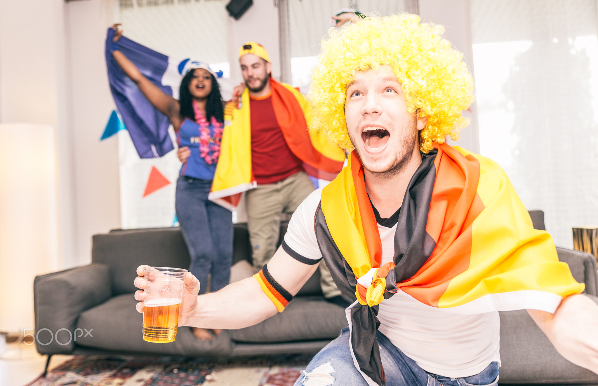 German supporter watching match at home