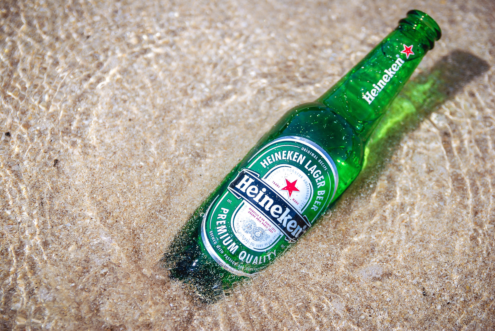 Nikon D80 + Sigma 18-50mm F2.8 EX DC Macro sample photo. Heineken & the beach photography