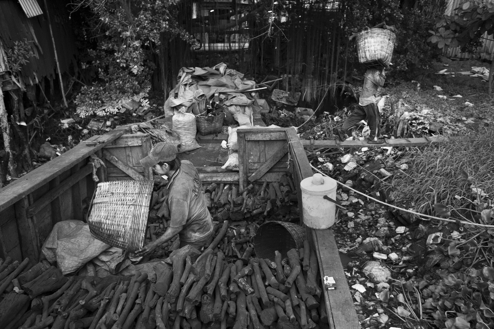 Canon EOS 5D + Canon EF 28mm F1.8 USM sample photo. Charcoal boat in hcm city photography