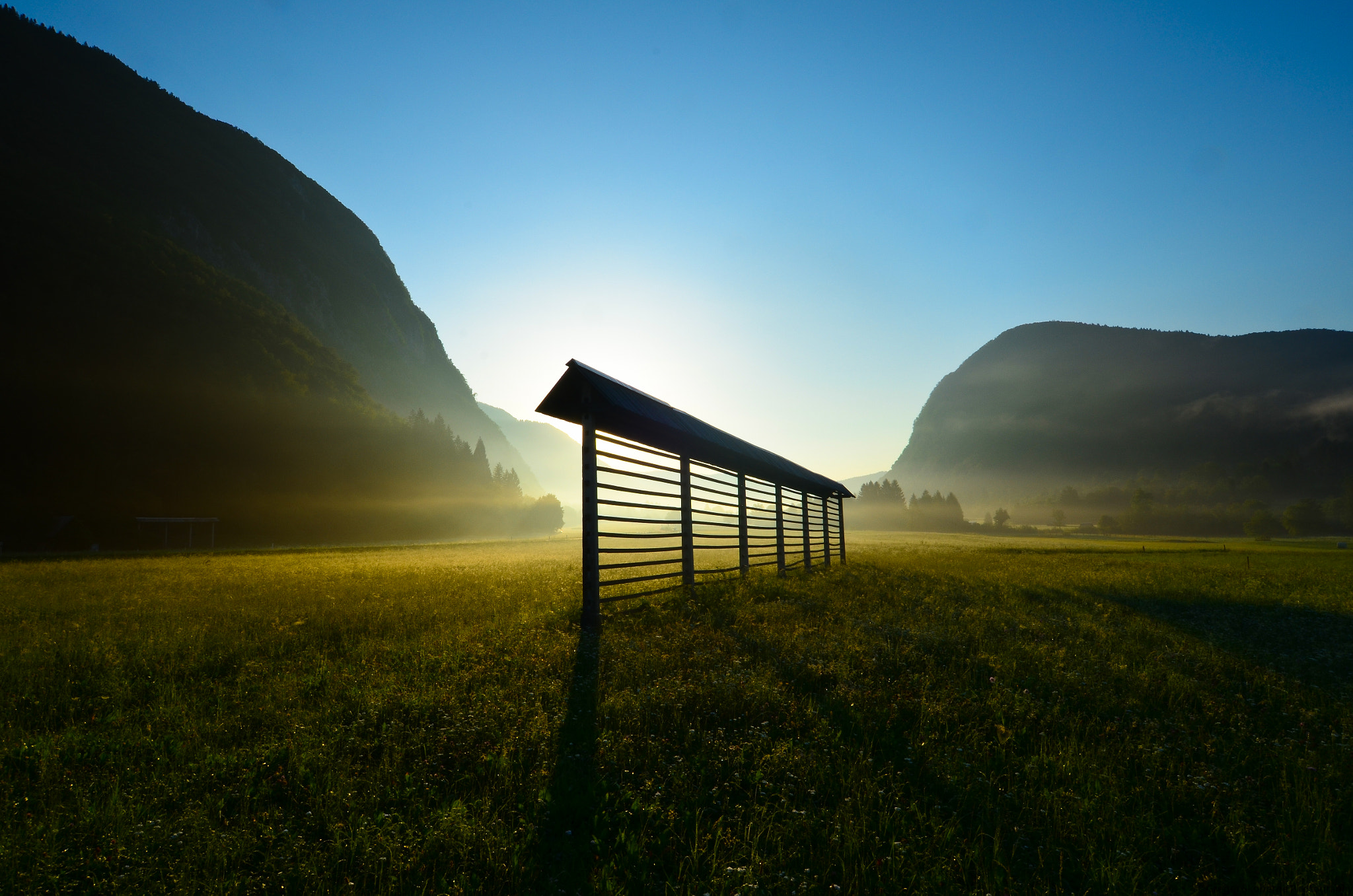 Nikon D5100 + Nikkor 45mm f/2.8 P sample photo. Hayrack in morning light photography