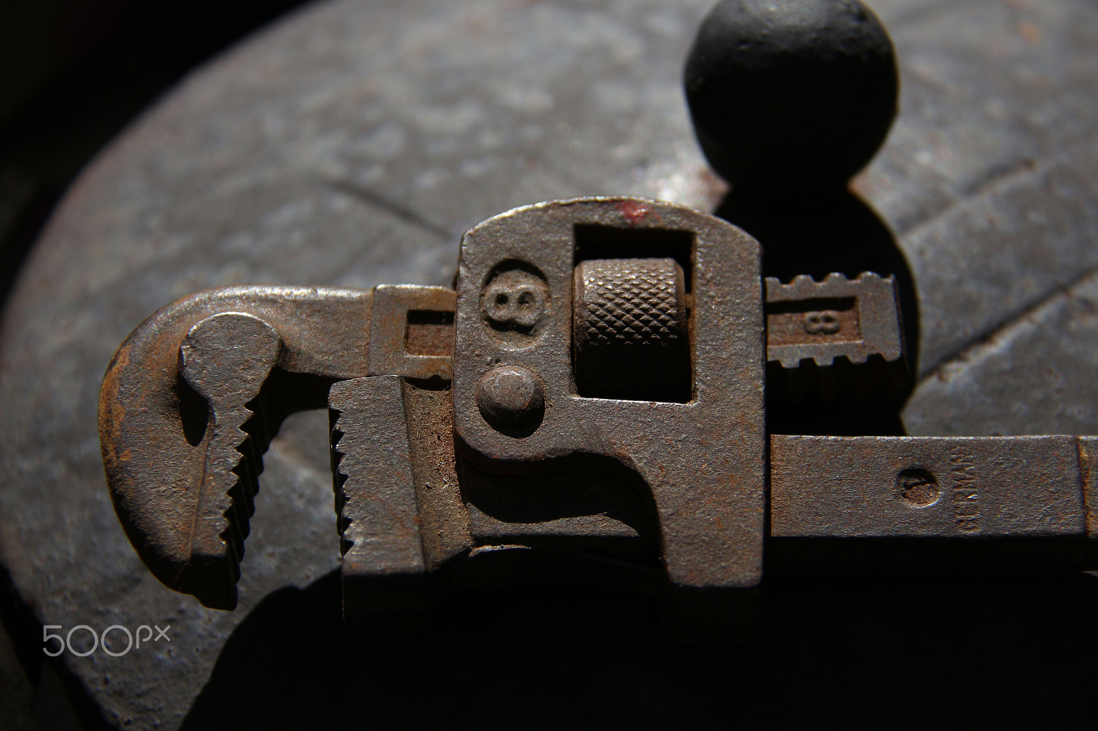 Canon EF-S 18-200mm F3.5-5.6 IS sample photo. Vintage cast-iron wrench photography