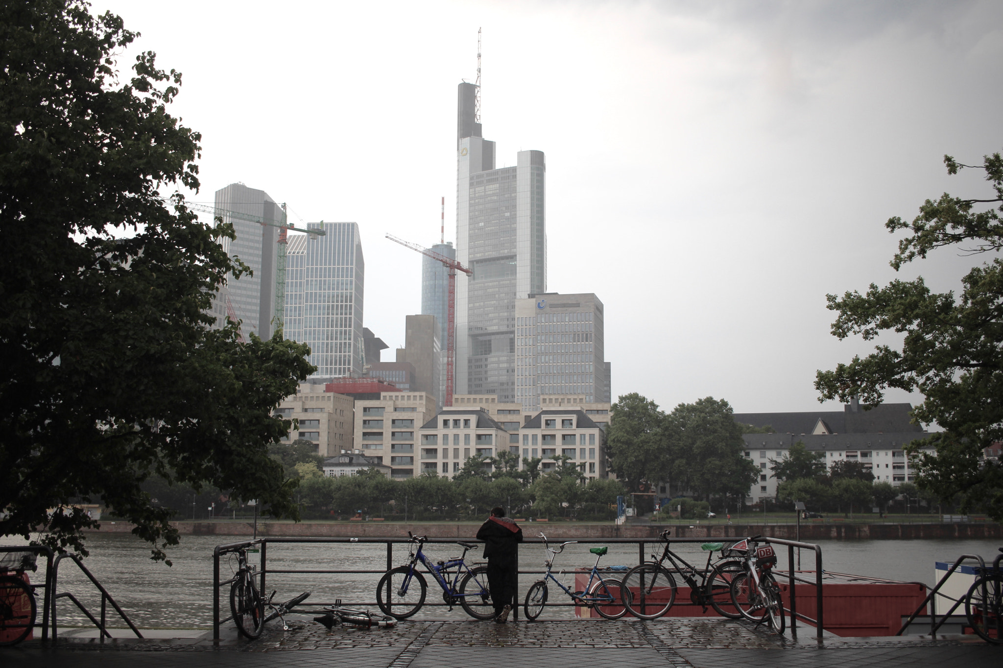 Canon EF-S 24mm F2.8 STM sample photo. Lonely man by the river photography