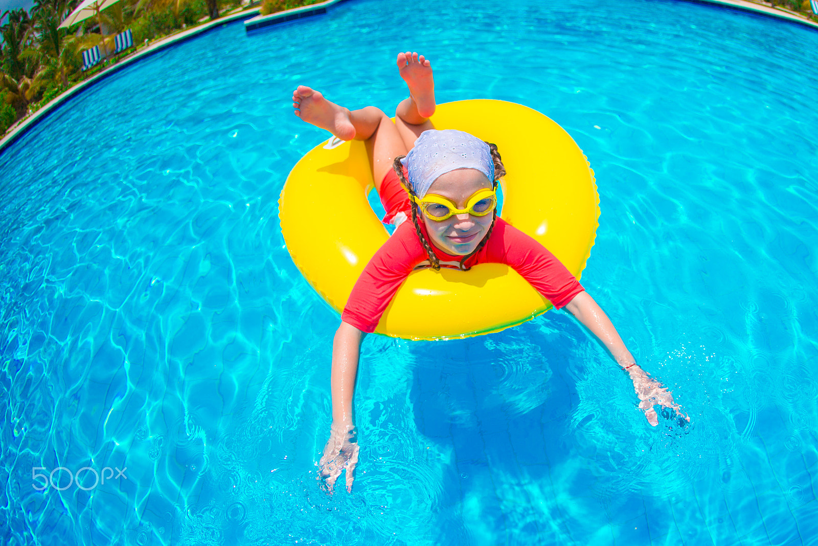 Canon EF 15mm F2.8 Fisheye sample photo. Adorable little girl with inflatable rubber circle during beach vacation. kid having fun on... photography