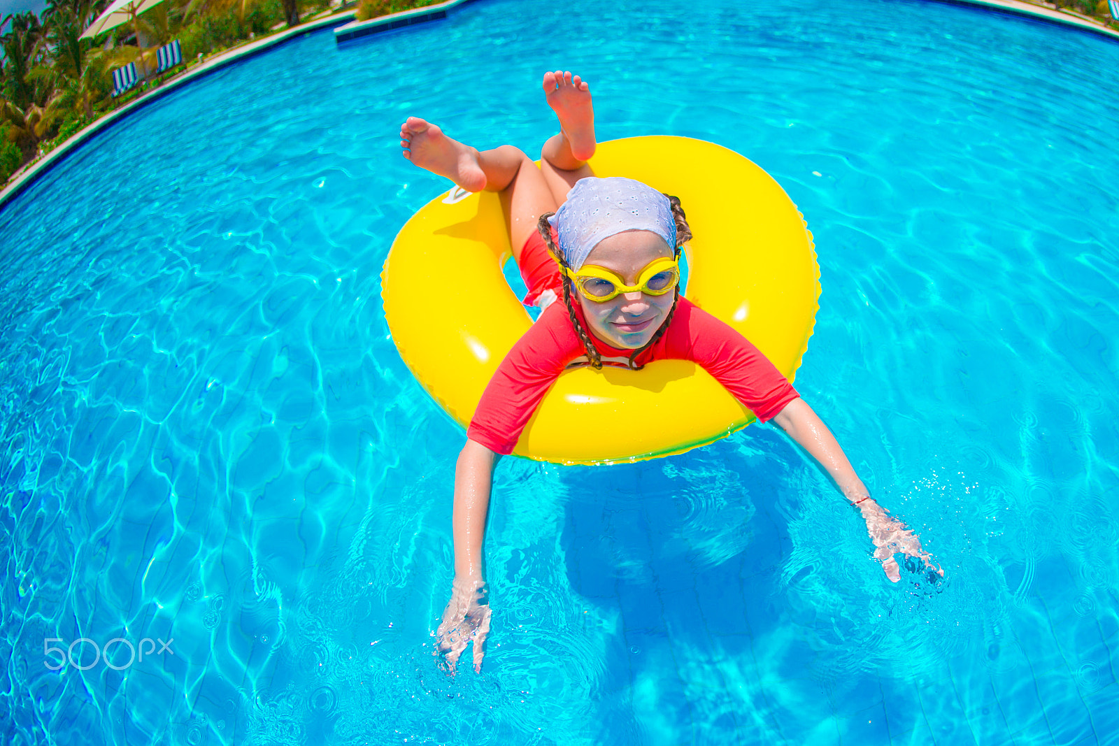 Canon EOS-1D X + Canon EF 15mm F2.8 Fisheye sample photo. Adorable little girl with inflatable rubber circle during beach vacation. kid having fun on... photography