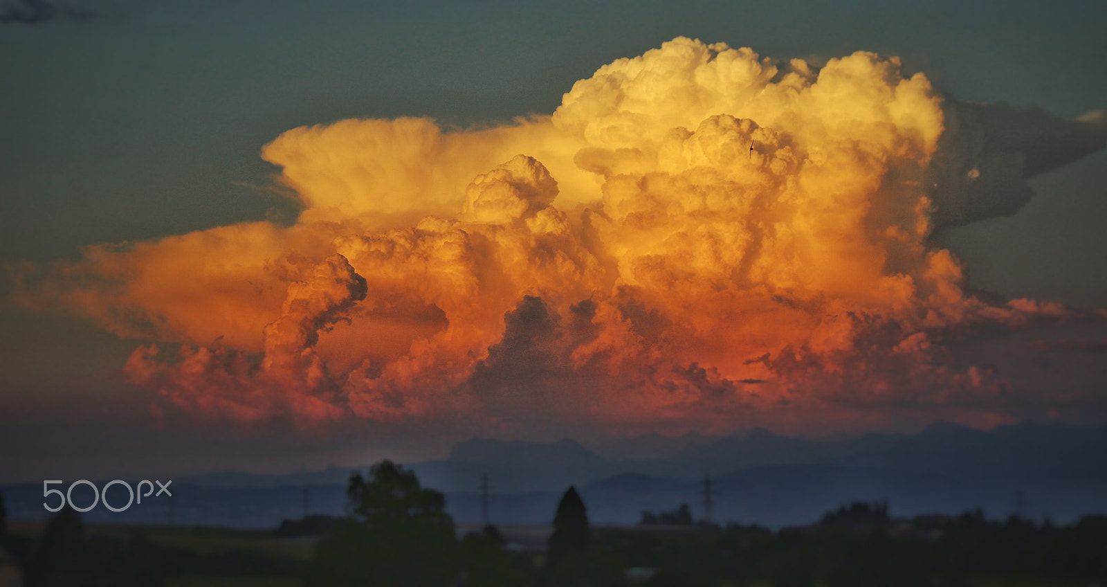 Canon EF-S 55-250mm F4-5.6 IS sample photo. The burning clouds.  deep sunset. photography