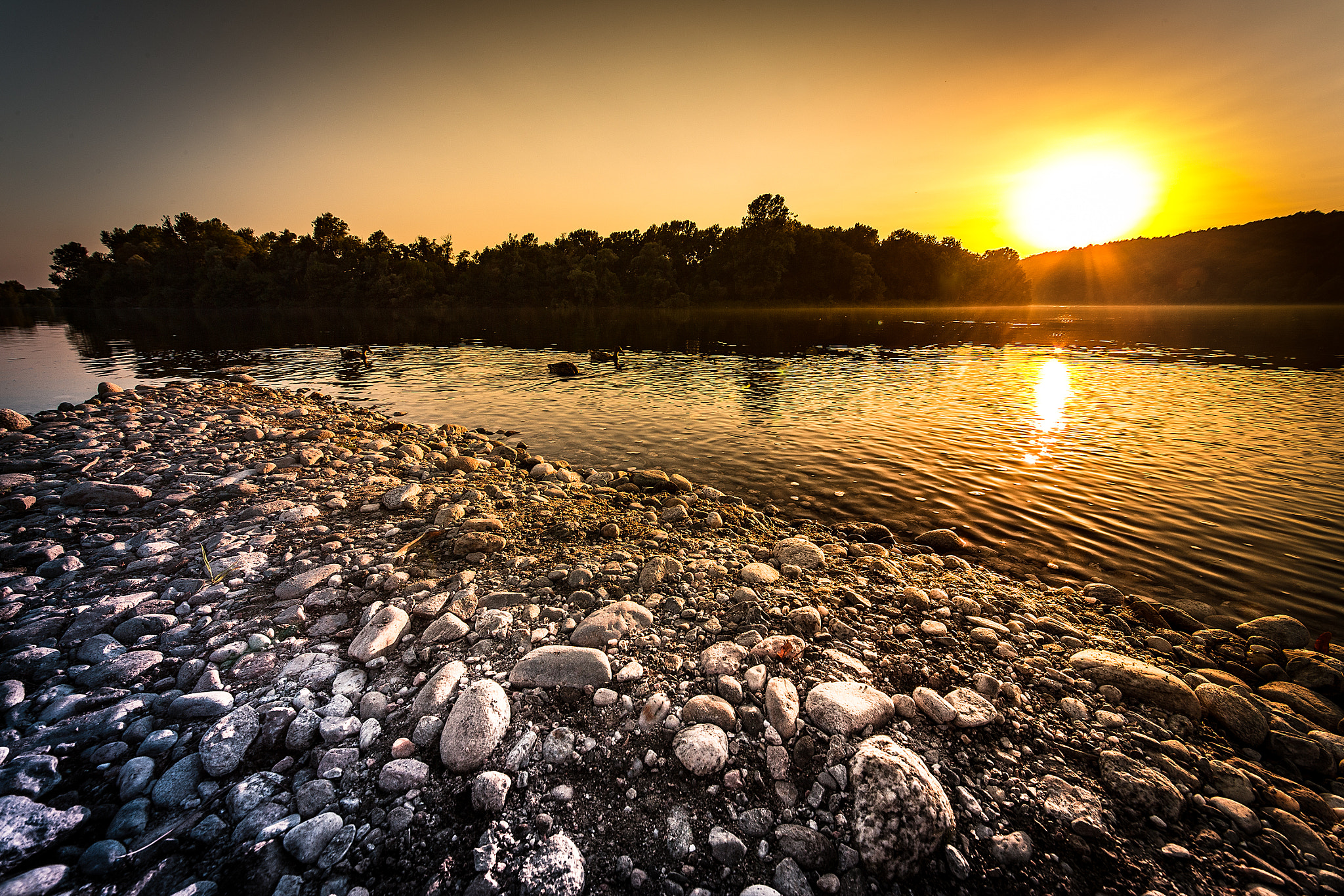 Canon EOS-1D X + Sigma 12-24mm F4.5-5.6 II DG HSM sample photo. Last sunset at ticino's river photography