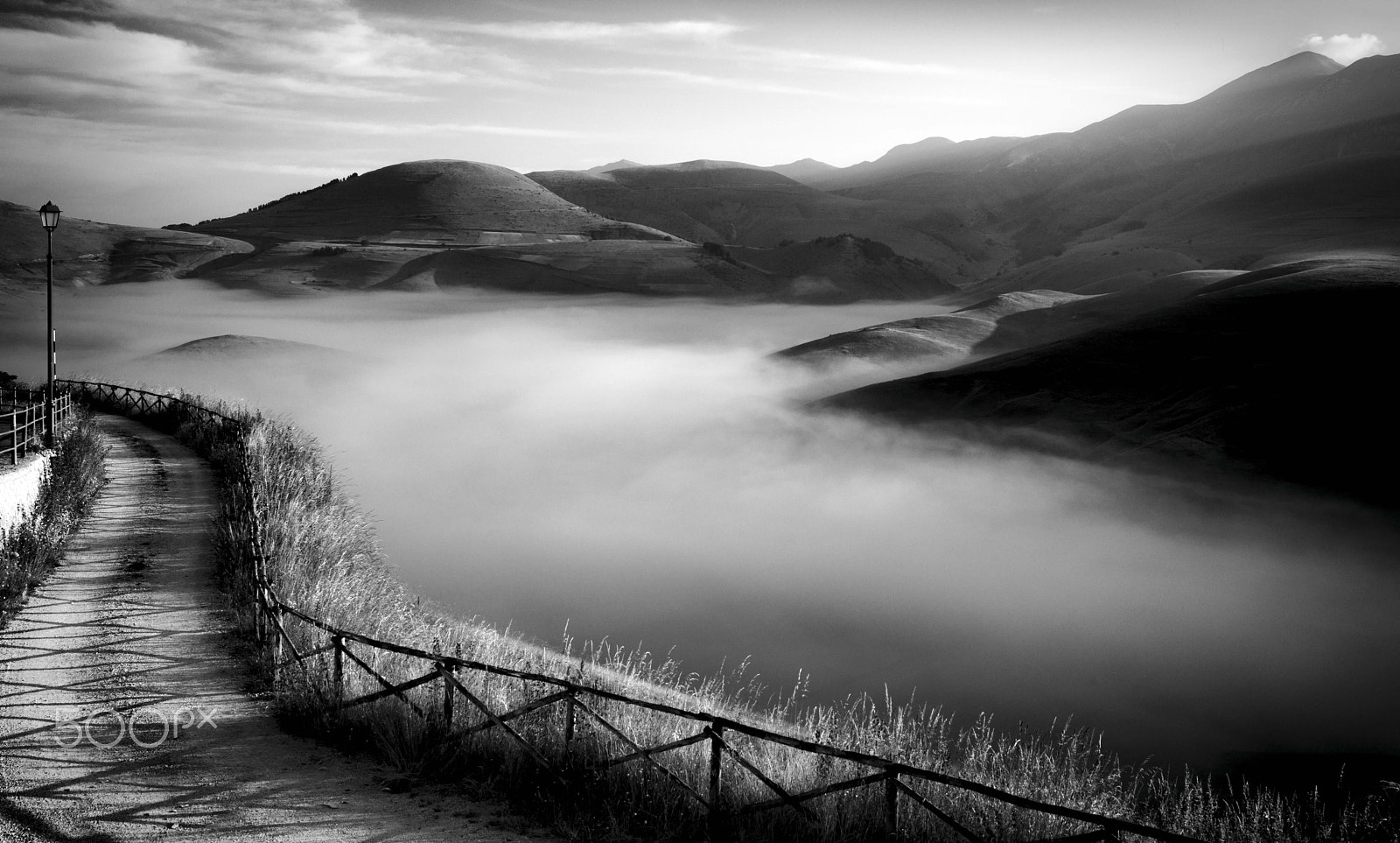 Nikon AF-S Nikkor 17-35mm F2.8D ED-IF sample photo. Fog in castelluccio's sunrise photography