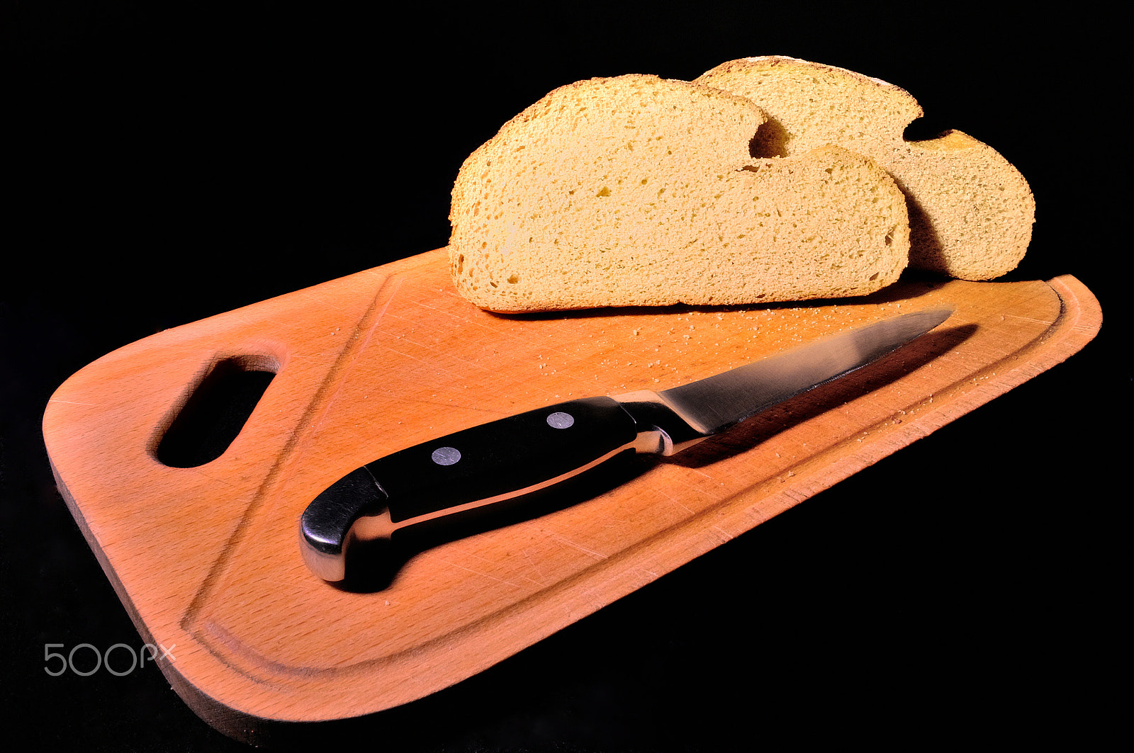 Nikon D5000 sample photo. Bread & knife photography