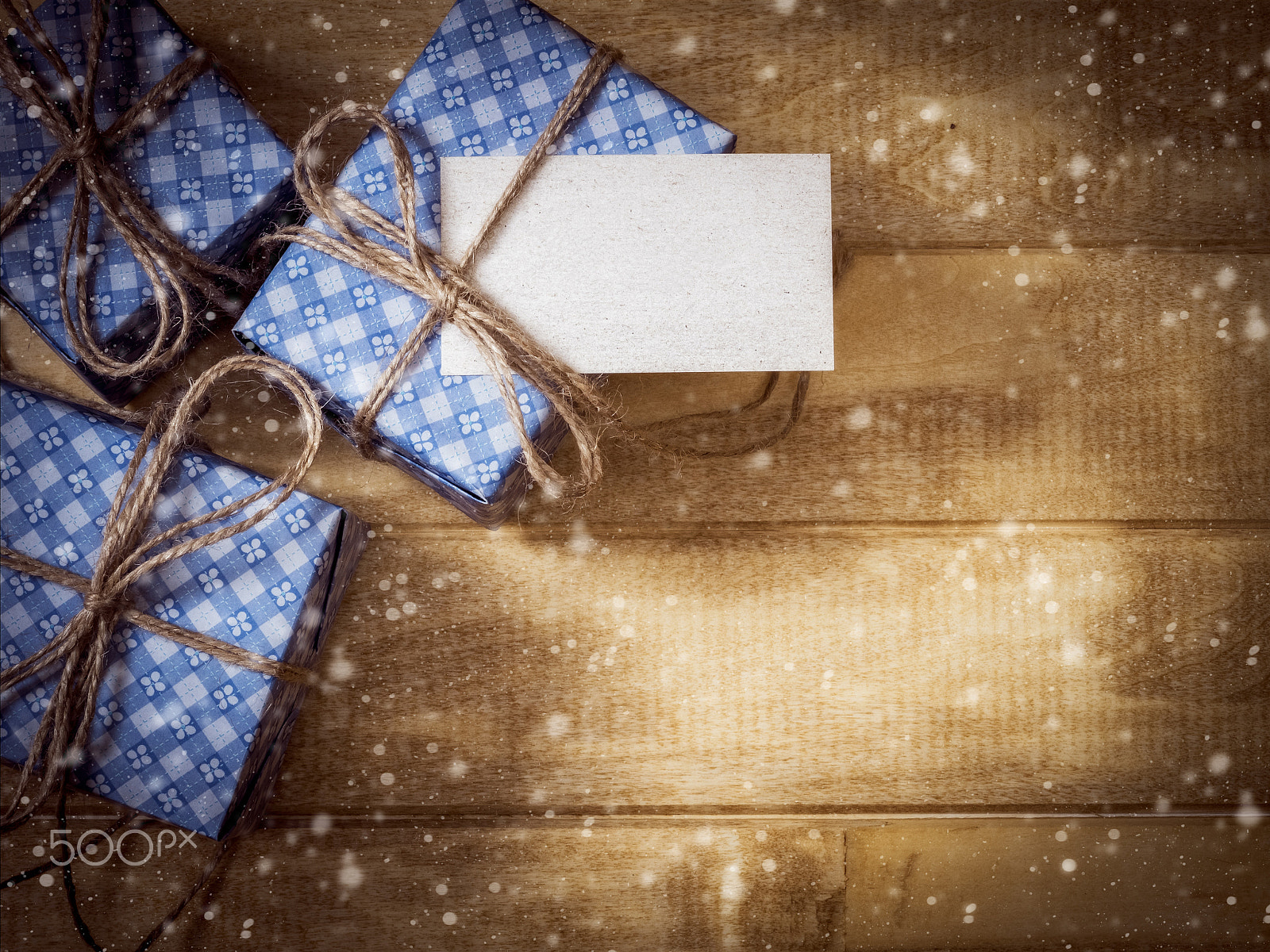 Olympus OM-D E-M1 + OLYMPUS 50mm Lens sample photo. Gift boxes in blue paper on the wooden table photography