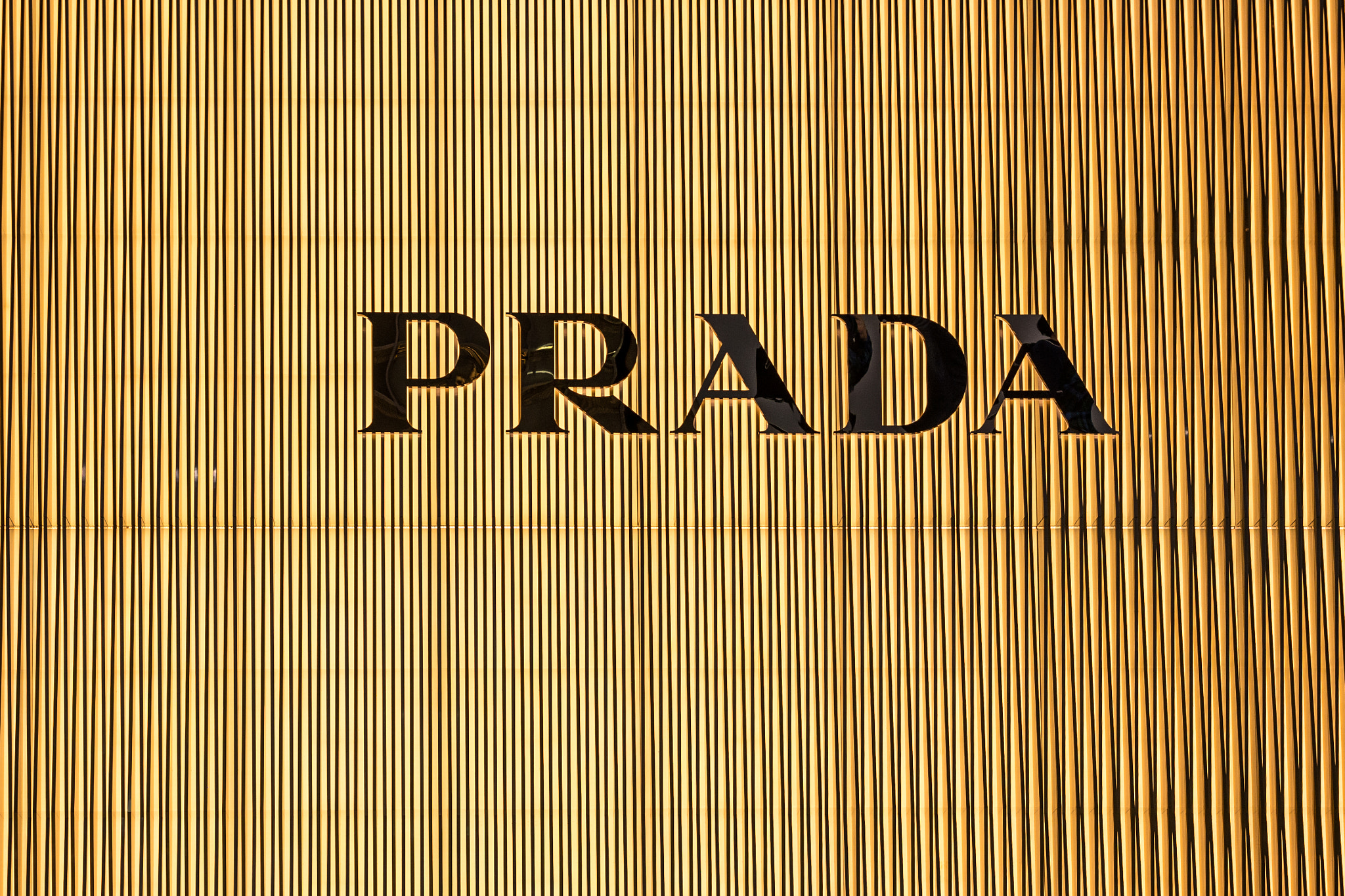 Panasonic Lumix DMC-G5 + Olympus M.Zuiko Digital 45mm F1.8 sample photo. Tokyo, japan - february 20, 2014 - letters in the prada store in ginza district, tokyo, japan photography