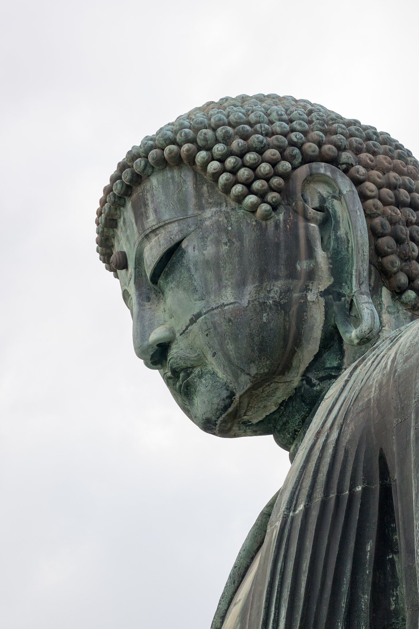 Panasonic Lumix DMC-G5 + Olympus M.Zuiko Digital 45mm F1.8 sample photo. The face of the buddha photography