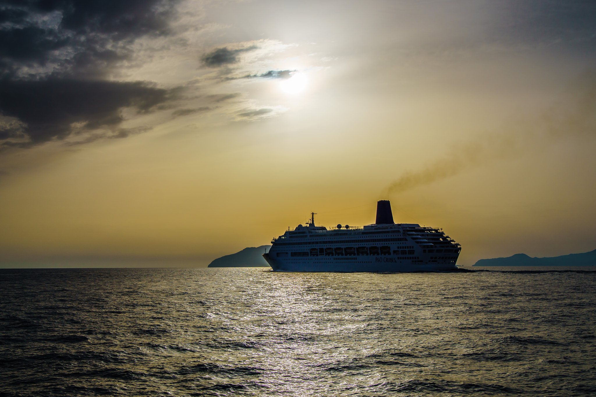 Sony ILCA-77M2 sample photo. A cruise ship during sunset photography