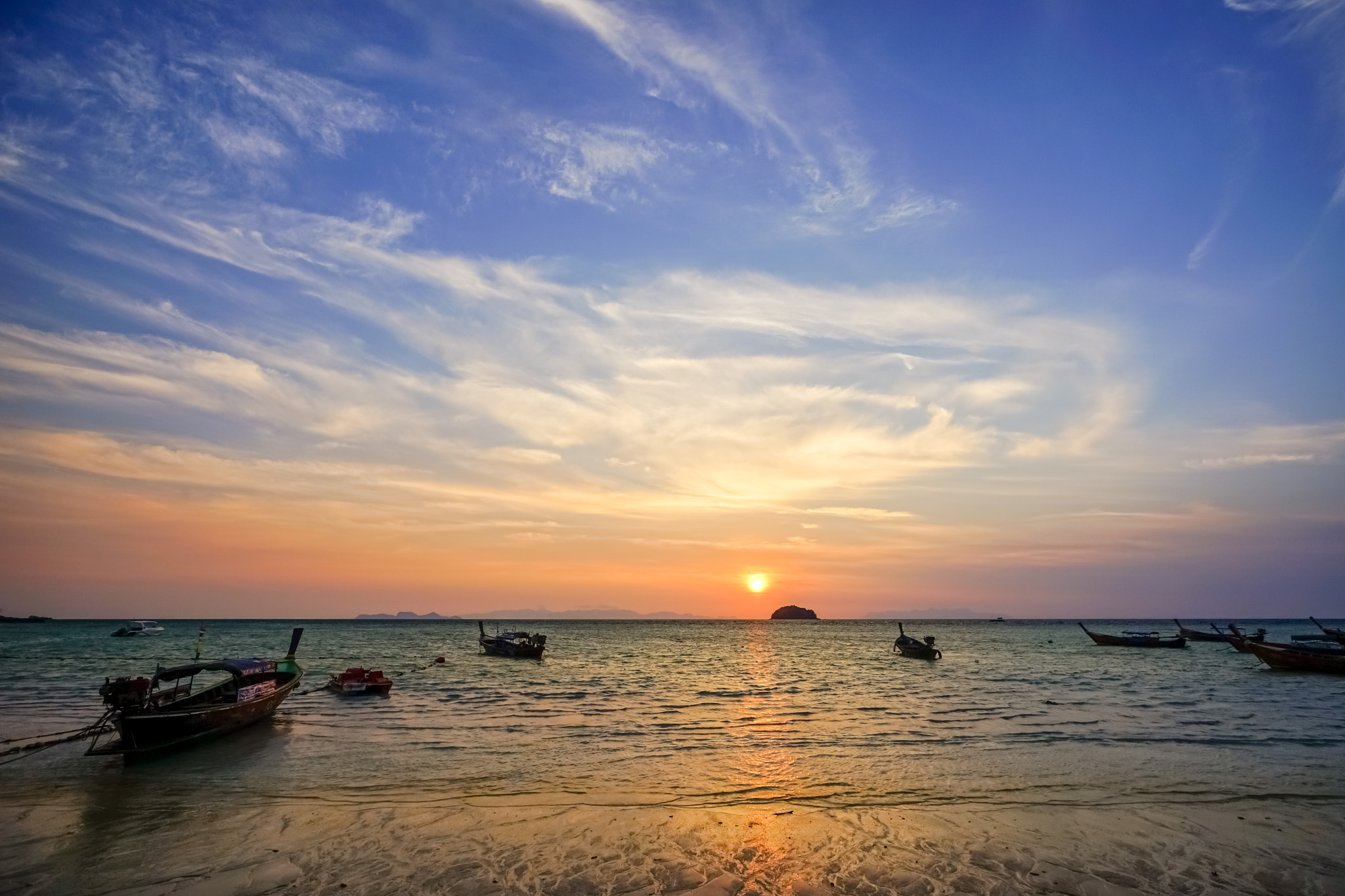 Sony a7 + Sony Vario-Sonnar T* 16-35mm F2.8 ZA SSM sample photo. Beautiful sunrise and thai fishing boats  at lipe island  ,  sat photography