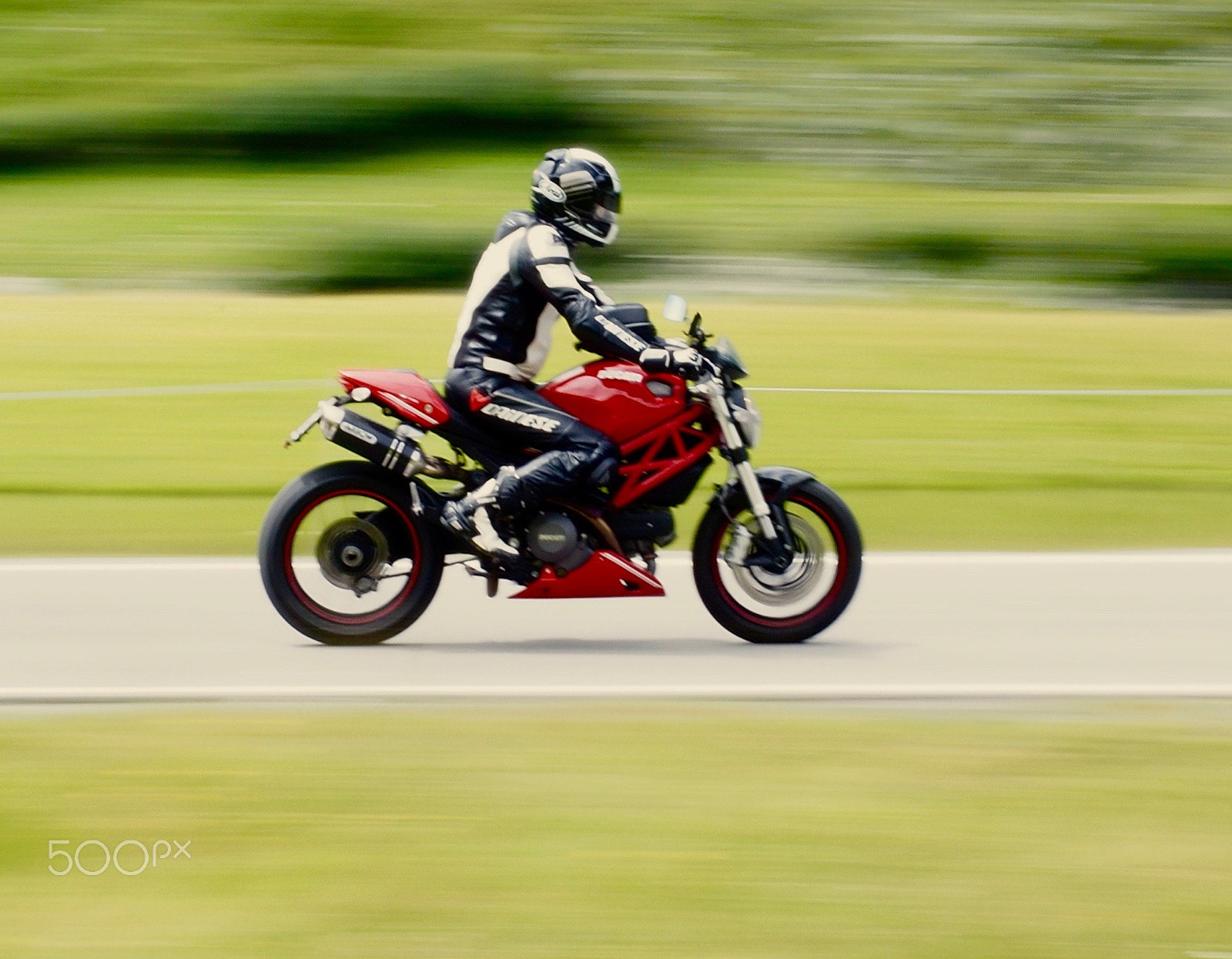 Olympus M.Zuiko Digital ED 12-40mm F2.8 Pro sample photo. Biker in the mountains photography