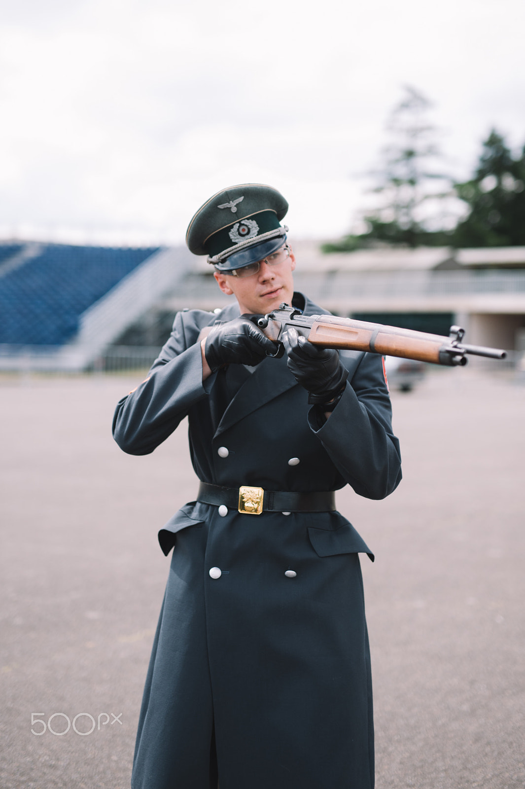 Nikon D700 + Sigma 50mm F1.4 DG HSM Art sample photo. A man with a gun photography