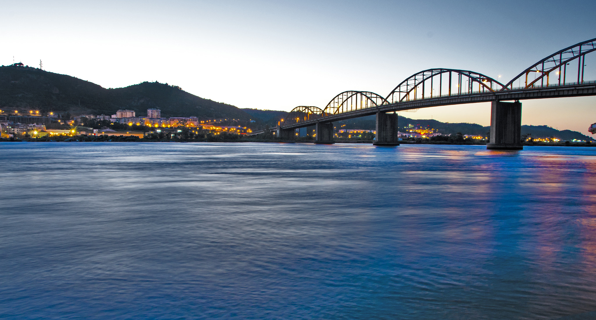 Nikon D5100 + Sigma 18-250mm F3.5-6.3 DC OS HSM sample photo. The bridge under the sunset photography