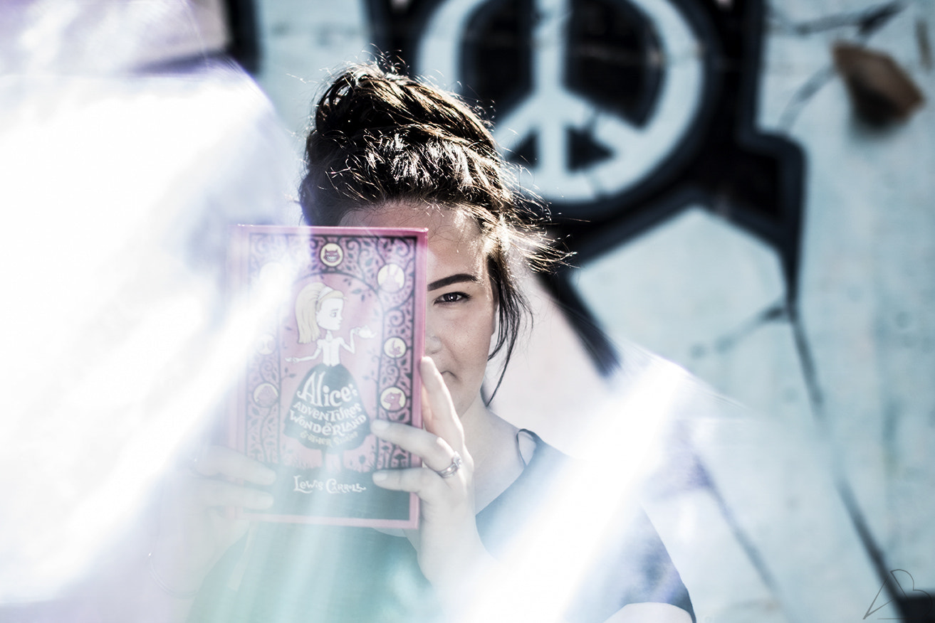 Sigma 50mm F1.4 EX DG HSM sample photo. The girl who loves books photography