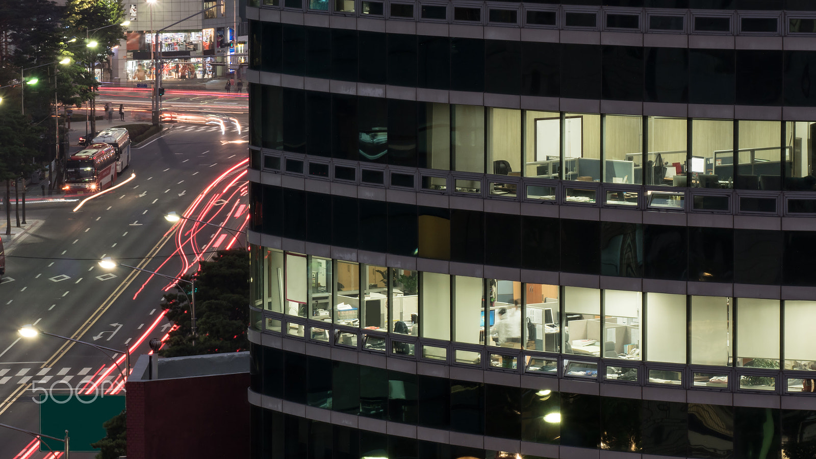 Panasonic Lumix DMC-GH4 sample photo. Office building in evening lights photography