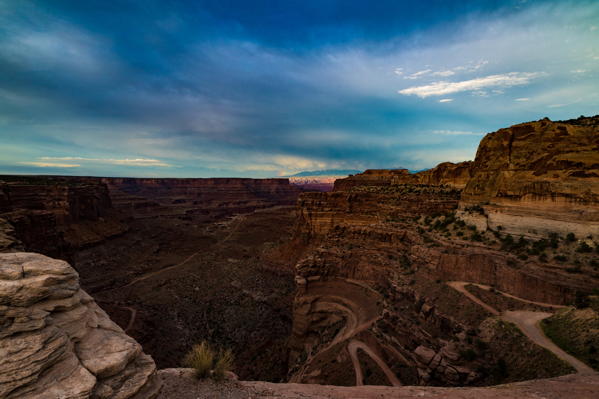 Nikon D810 + Nikon AF Nikkor 20mm F2.8D sample photo. Evening rain over canyonlands photography