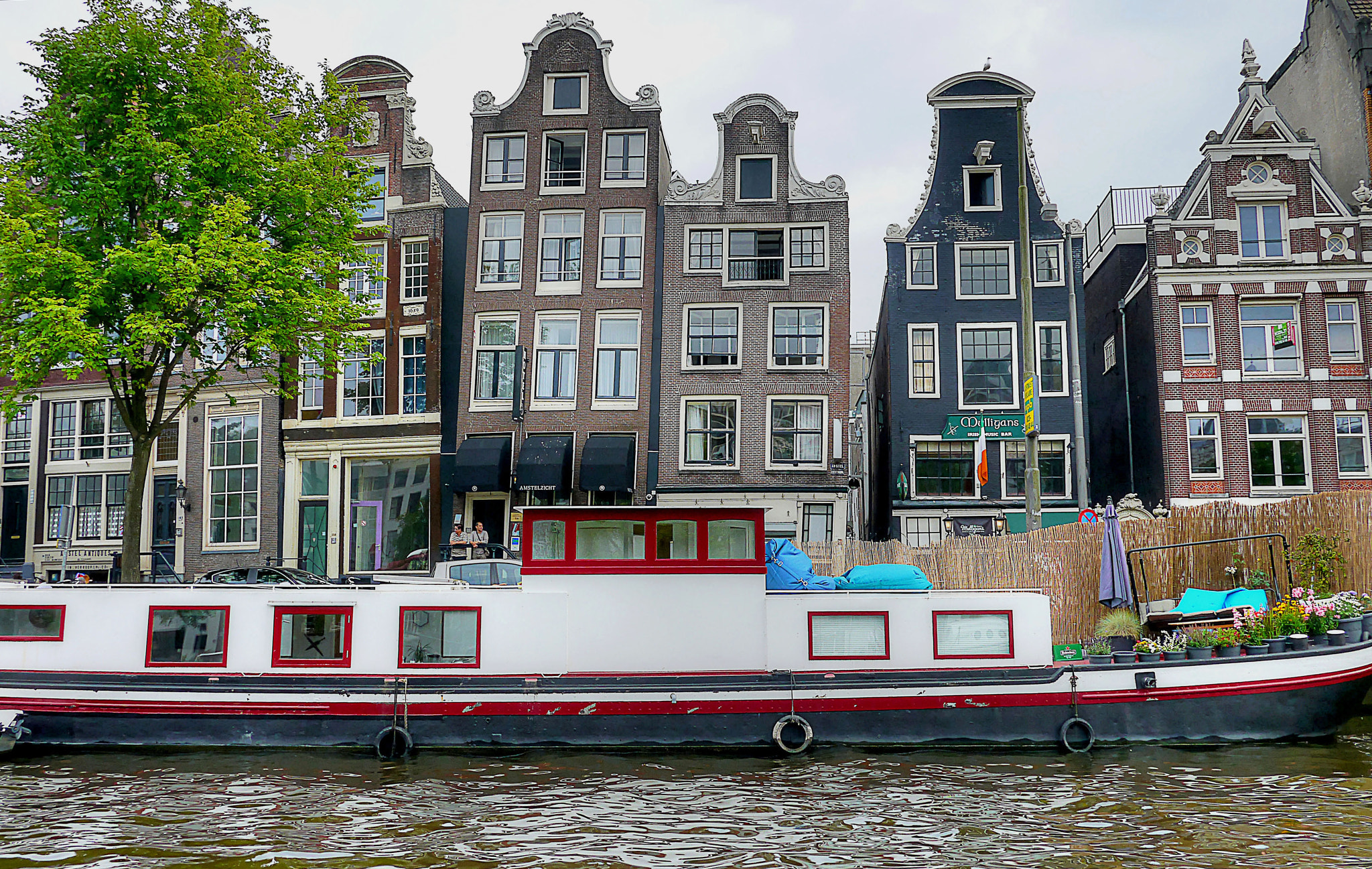 Panasonic Lumix DMC-G3 + Panasonic Lumix G 14mm F2.5 ASPH sample photo. Dancing houses, amsterdam photography