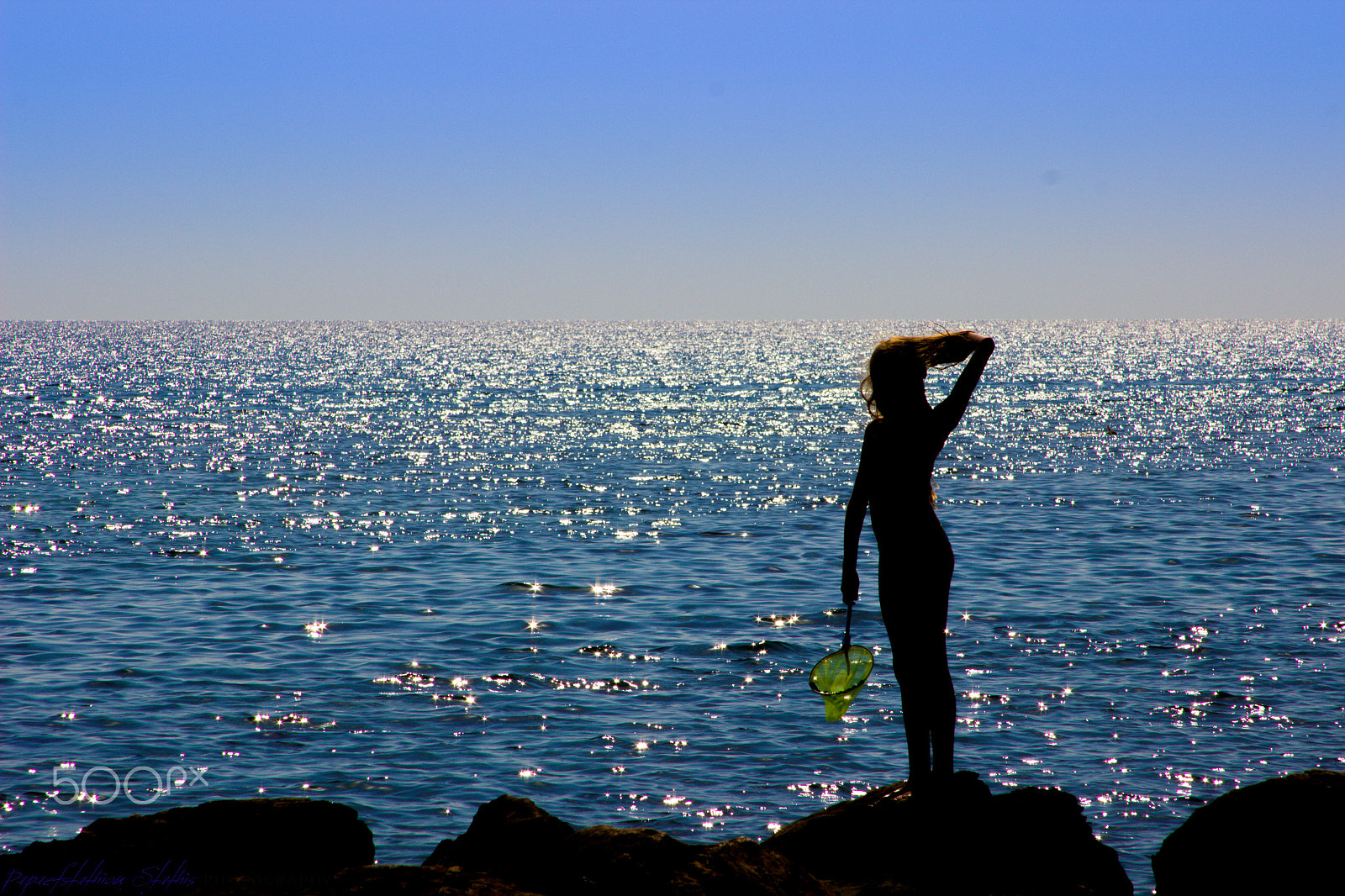 Canon EF 28-135mm F3.5-5.6 IS USM sample photo. Mystery fishing girl photography