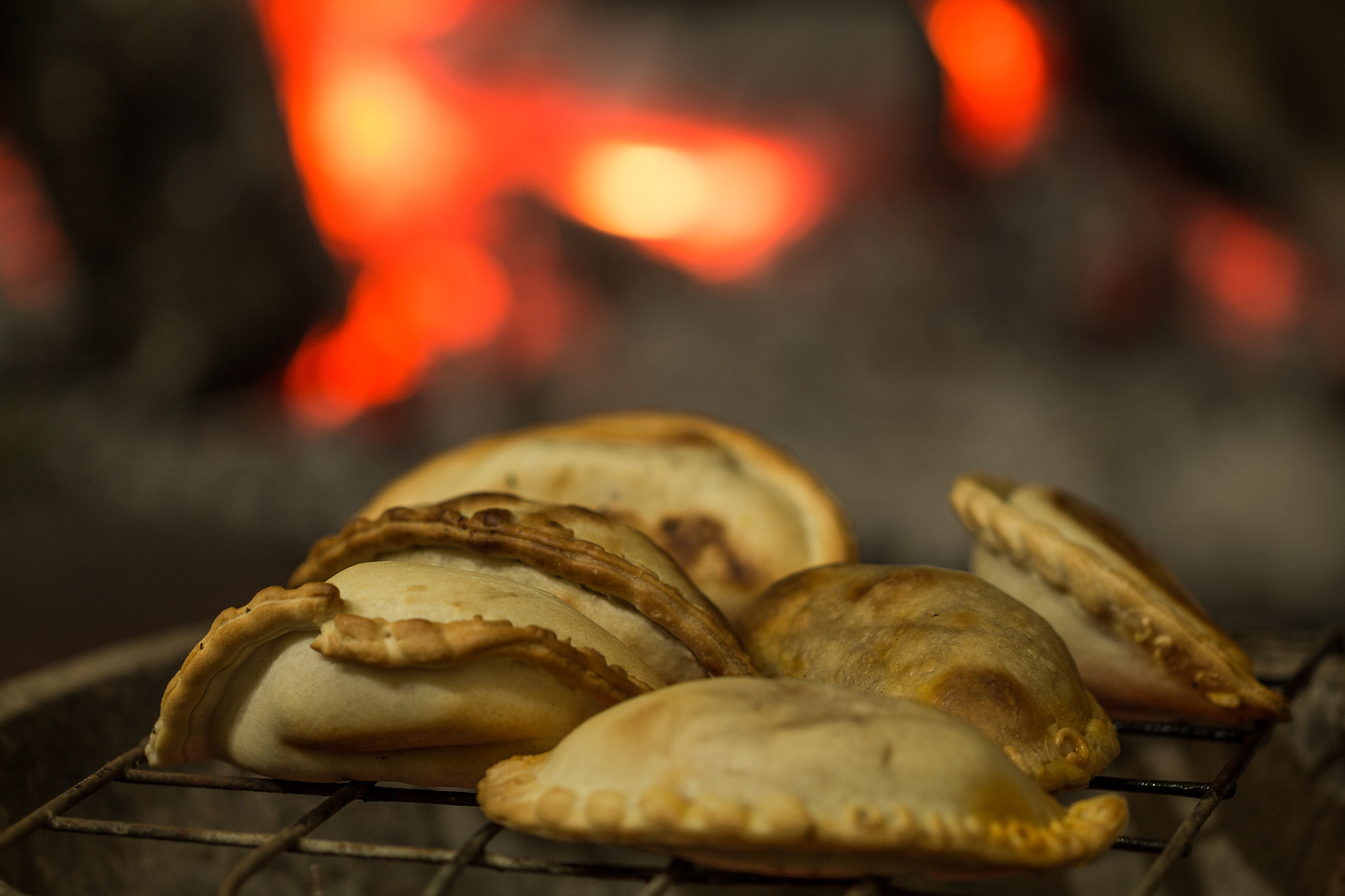 Canon EF 100mm F2.8L Macro IS USM sample photo. Cooking with embers at grill photography