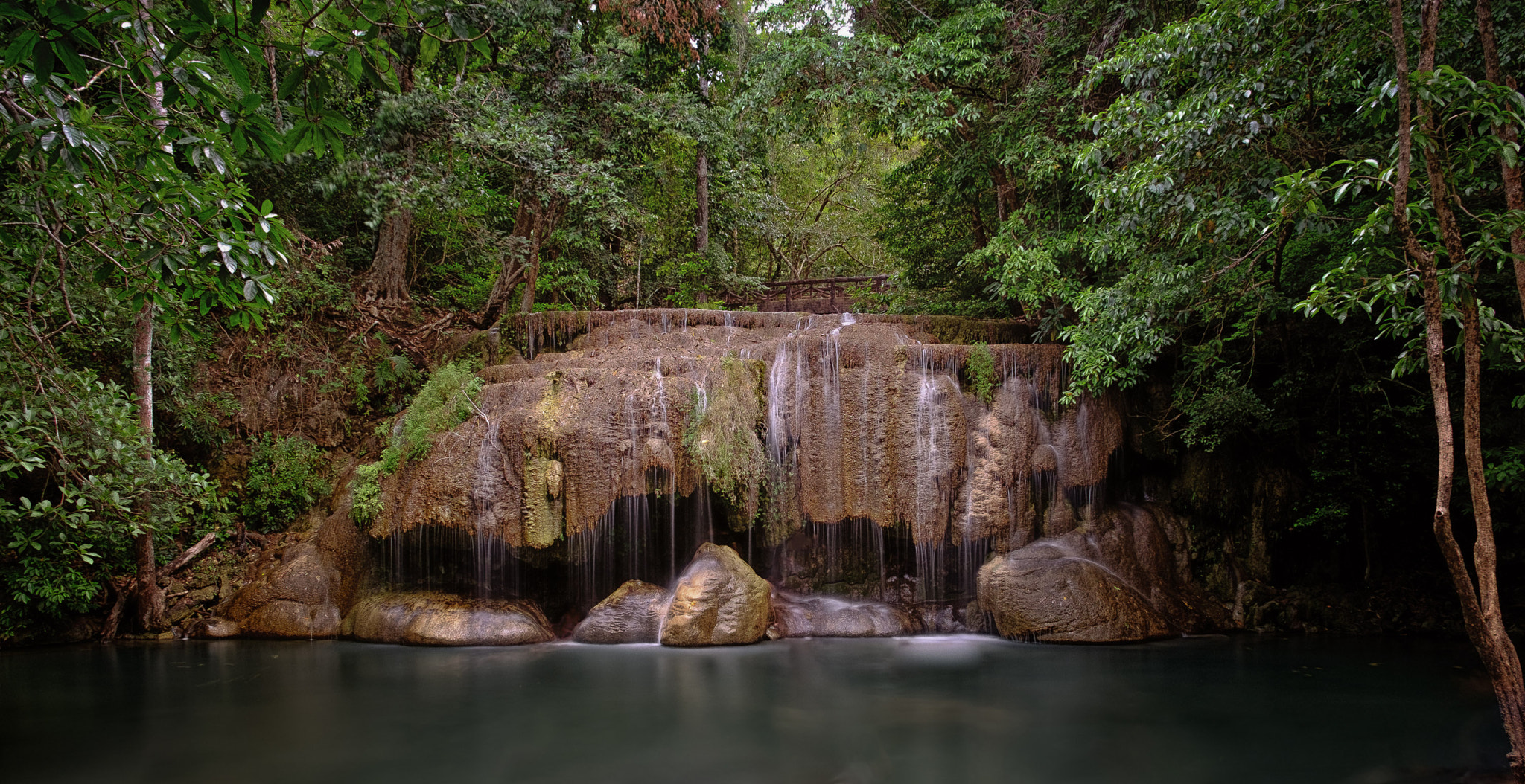 Fujifilm X-M1 + Fujifilm XF 18-135mm F3.5-5.6 R LM OIS WR sample photo. Waterfall in the jungle photography