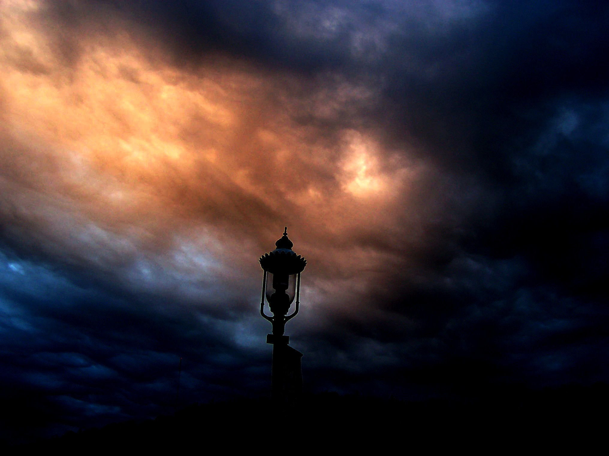 Kodak CX7330 ZOOM DIGITAL CAMERA sample photo. Sunset in a backdrop of storm clouds photography