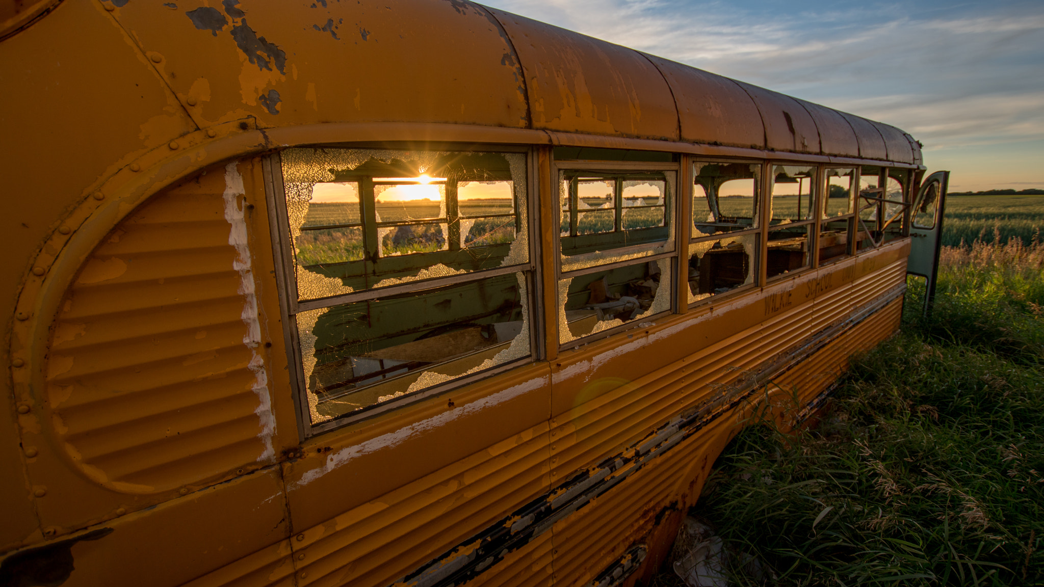 Sony a6300 + Sigma 10-20mm F3.5 EX DC HSM sample photo. Busted up bus photography