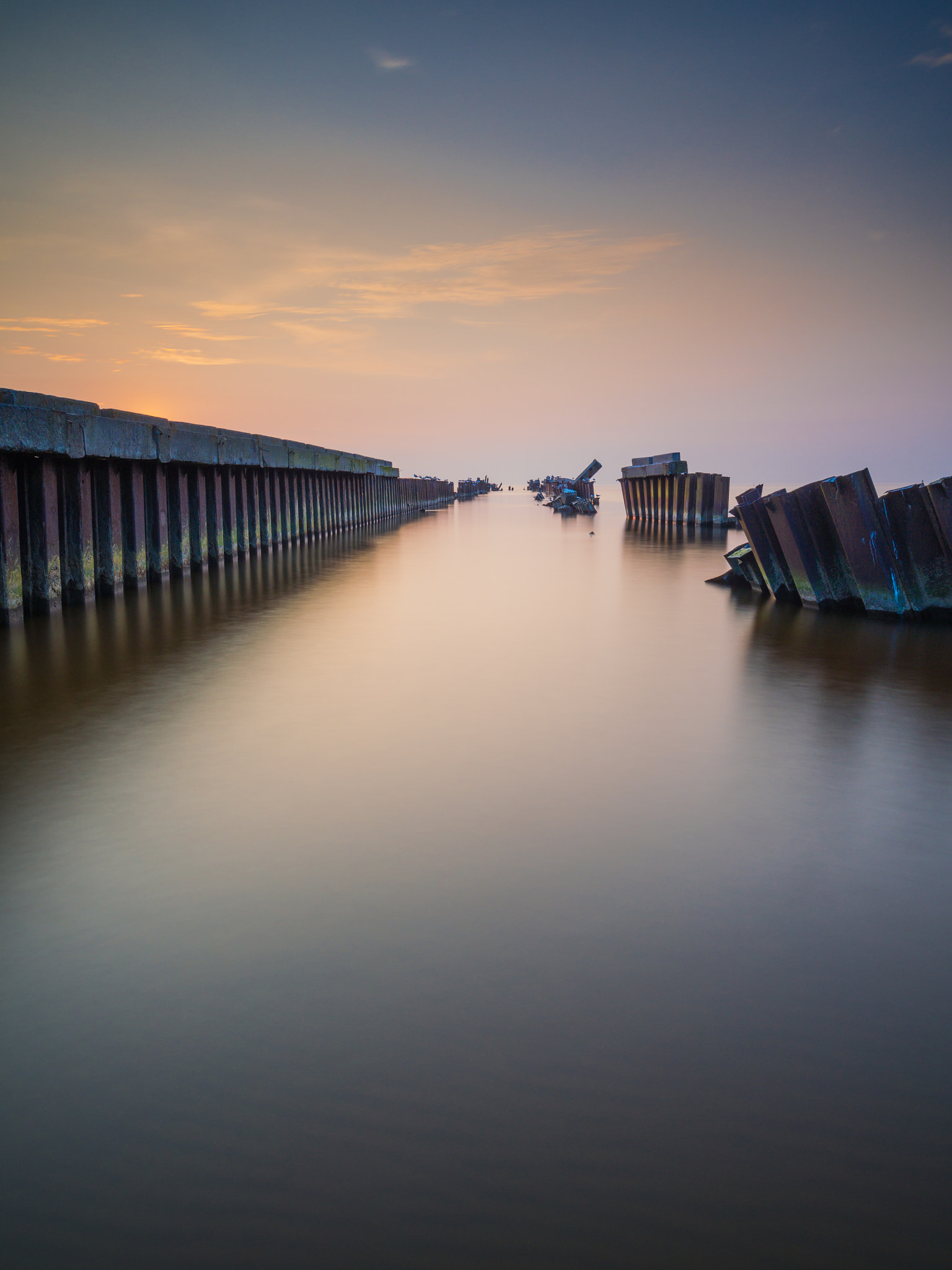 Olympus OM-D E-M5 + Olympus M.Zuiko Digital ED 7-14mm F2.8 PRO sample photo. Evening sunset on an old pier. photography