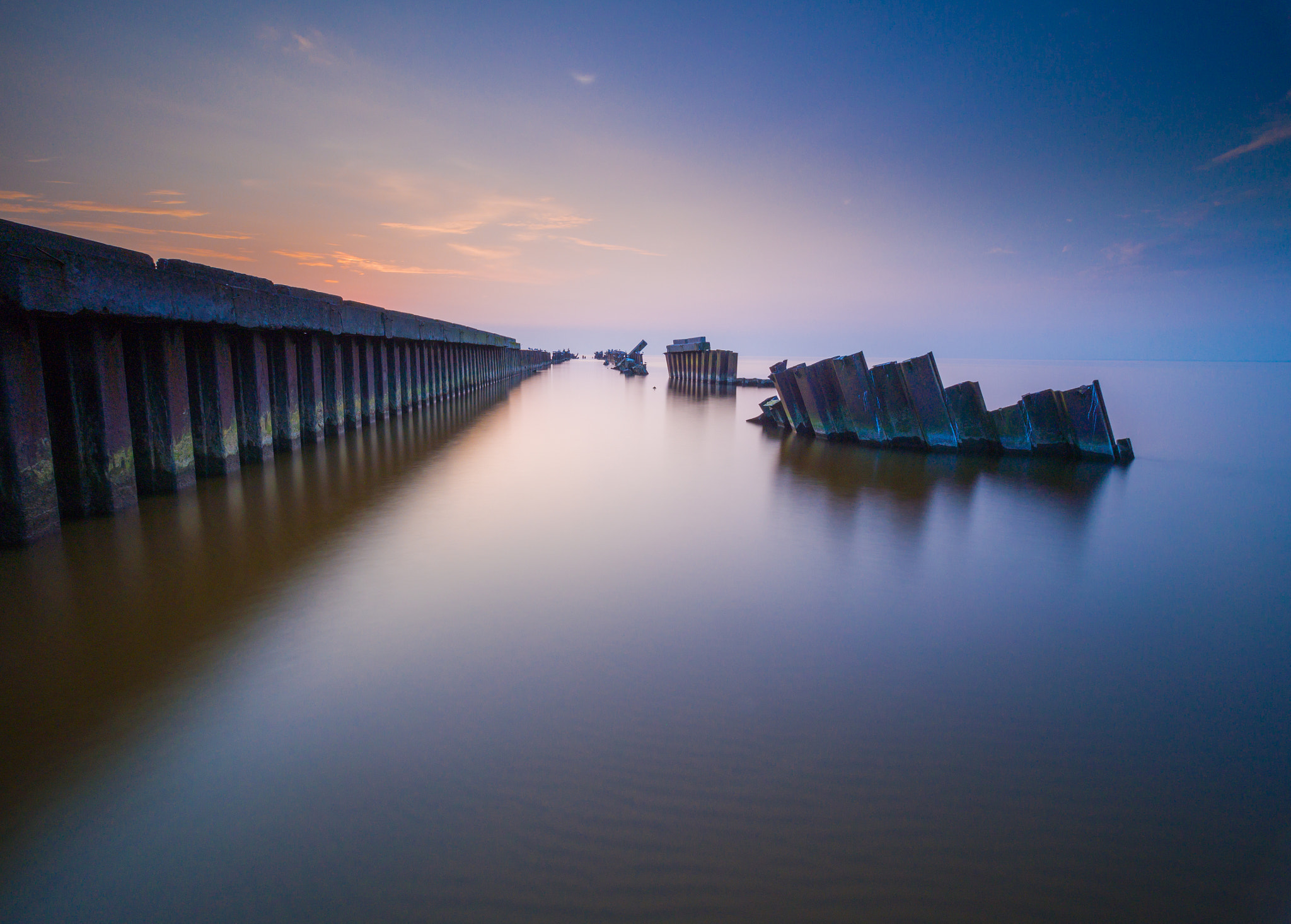Olympus OM-D E-M5 + Olympus M.Zuiko Digital ED 7-14mm F2.8 PRO sample photo. Evening sunset on an old pier. photography
