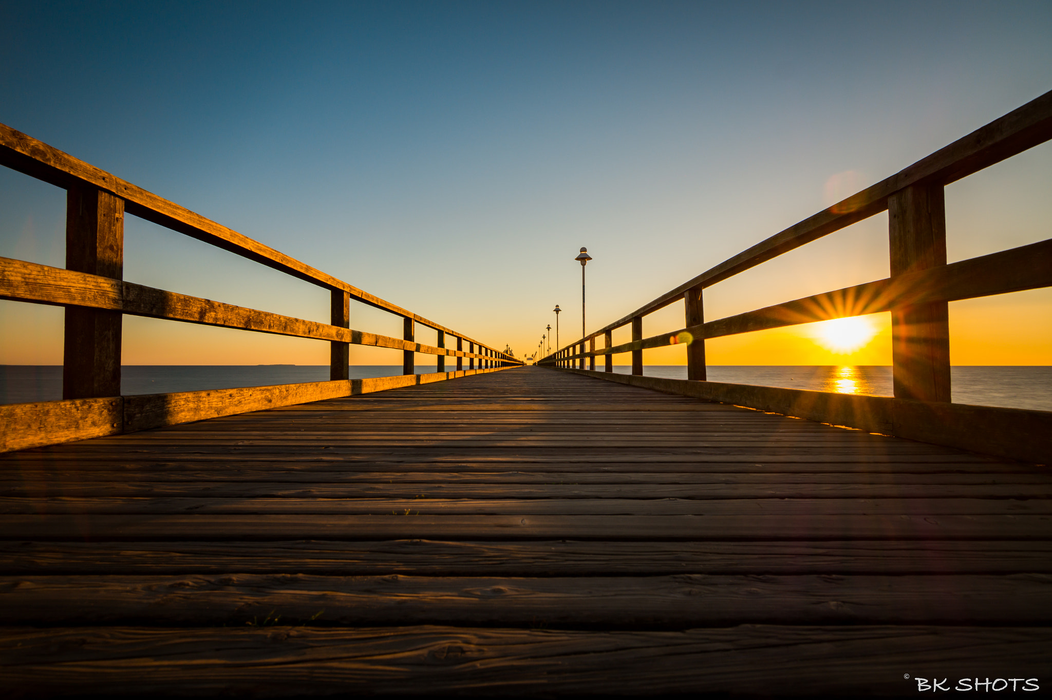 Sony SLT-A58 + 20mm F2.8 sample photo. Sunrise at the pier in zinnowitz (germany) photography