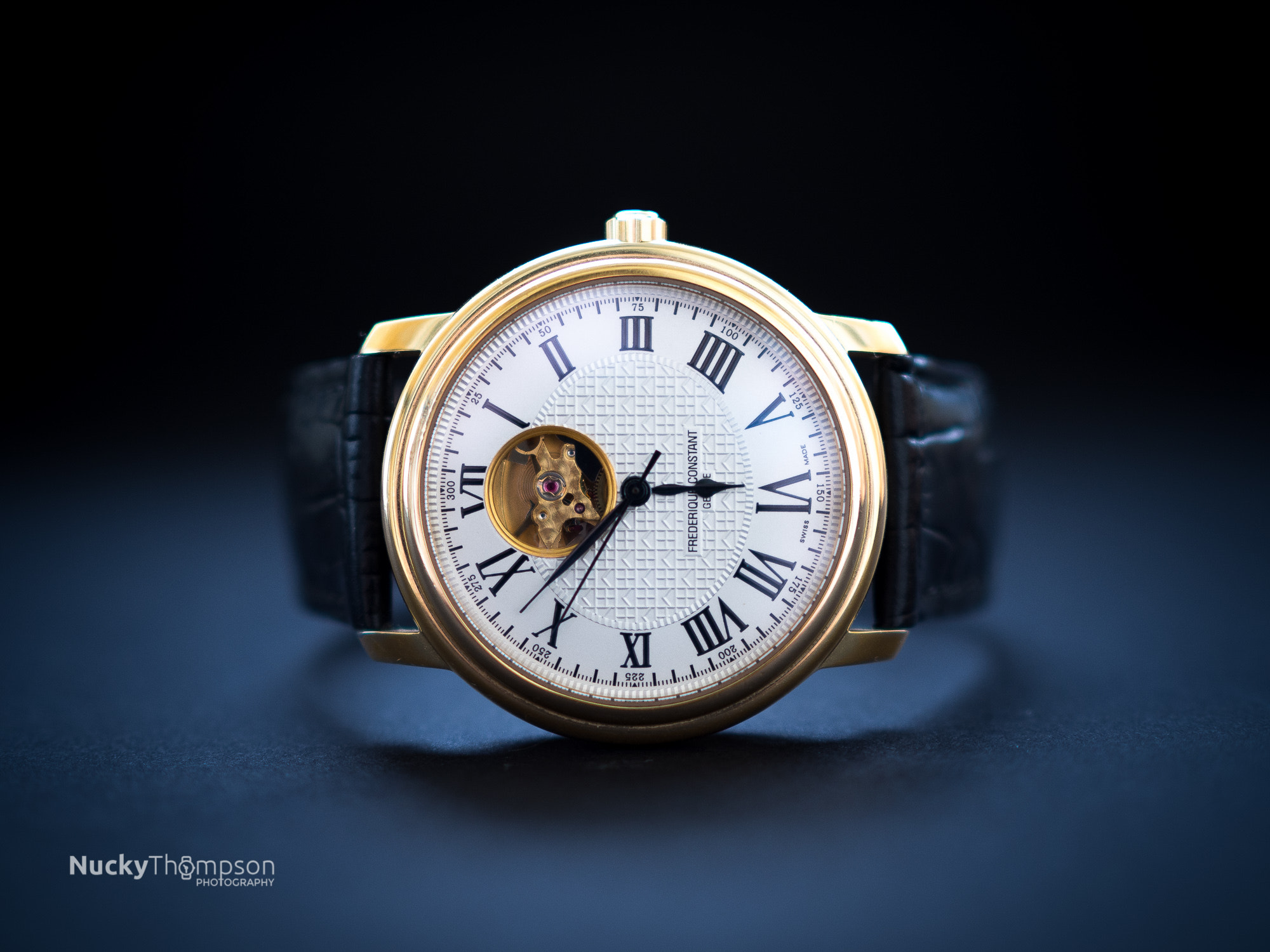 Olympus OM-D E-M10 II + Olympus M.Zuiko Digital 25mm F1.8 sample photo. Frederique constant open heart gold watch photography