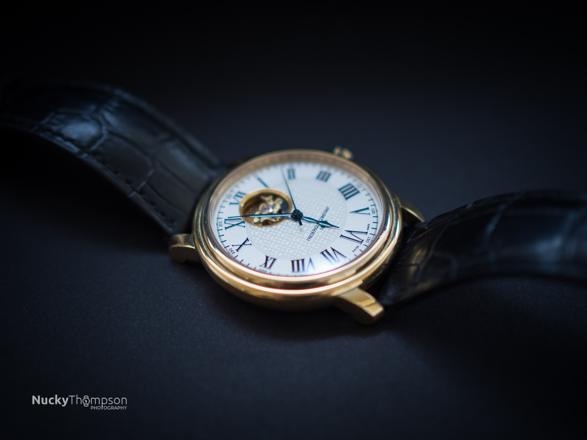 Olympus OM-D E-M10 II + Olympus M.Zuiko Digital 25mm F1.8 sample photo. Frederique constant open heart gold watch photography