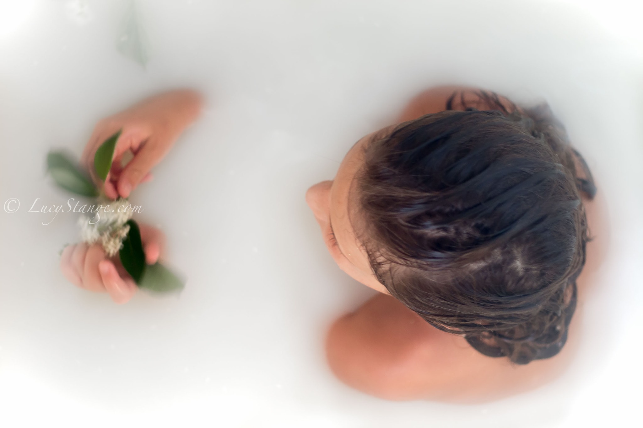 Canon EOS 700D (EOS Rebel T5i / EOS Kiss X7i) + Canon EF 50mm F1.8 II sample photo. This shot was done in a bathtub filled with honey, oats and milk. to create a milky bath shot. photography