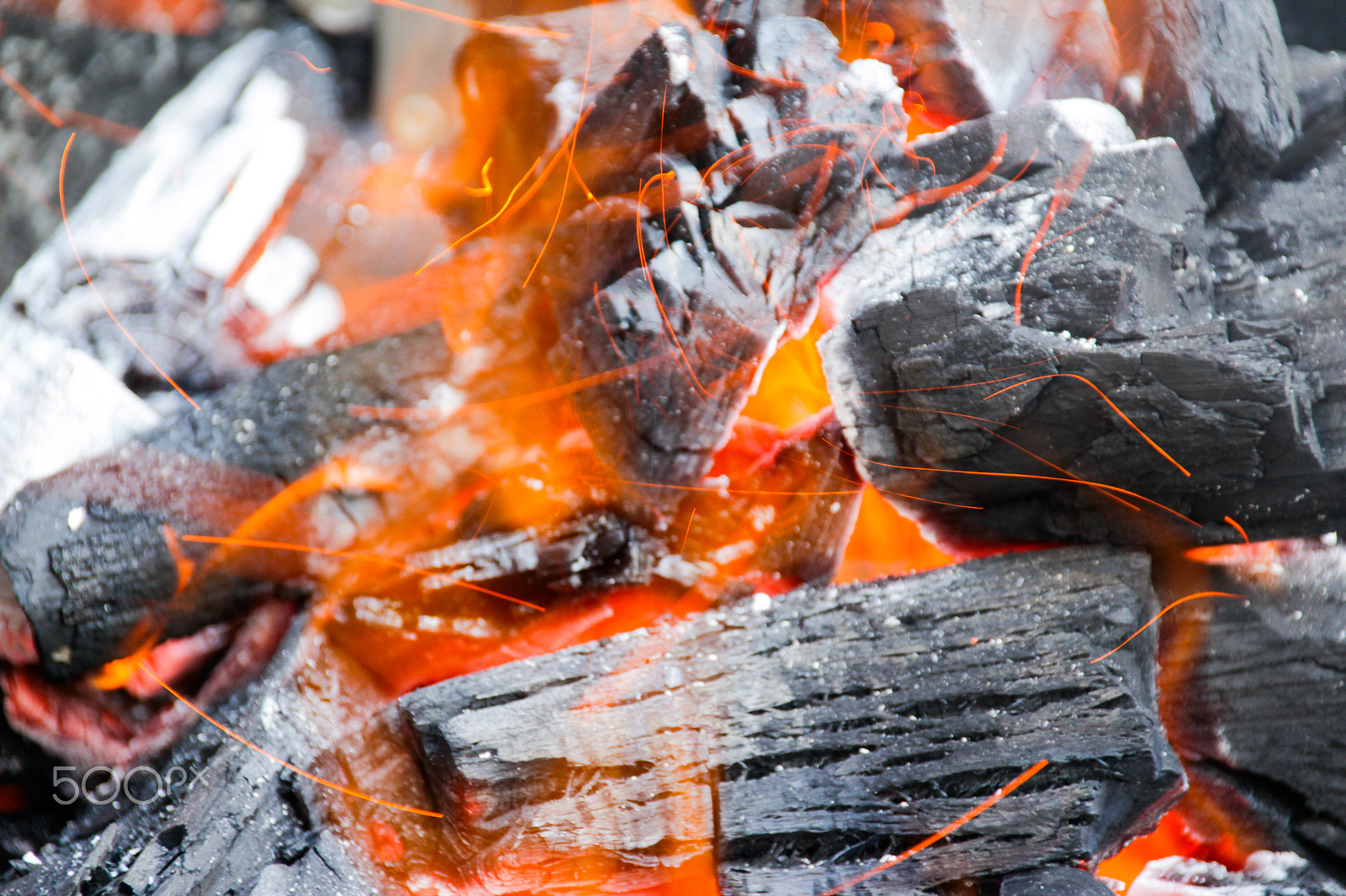 Sigma 18-250mm F3.5-6.3 DC OS HSM sample photo. Wood charcoal and fire flames photography