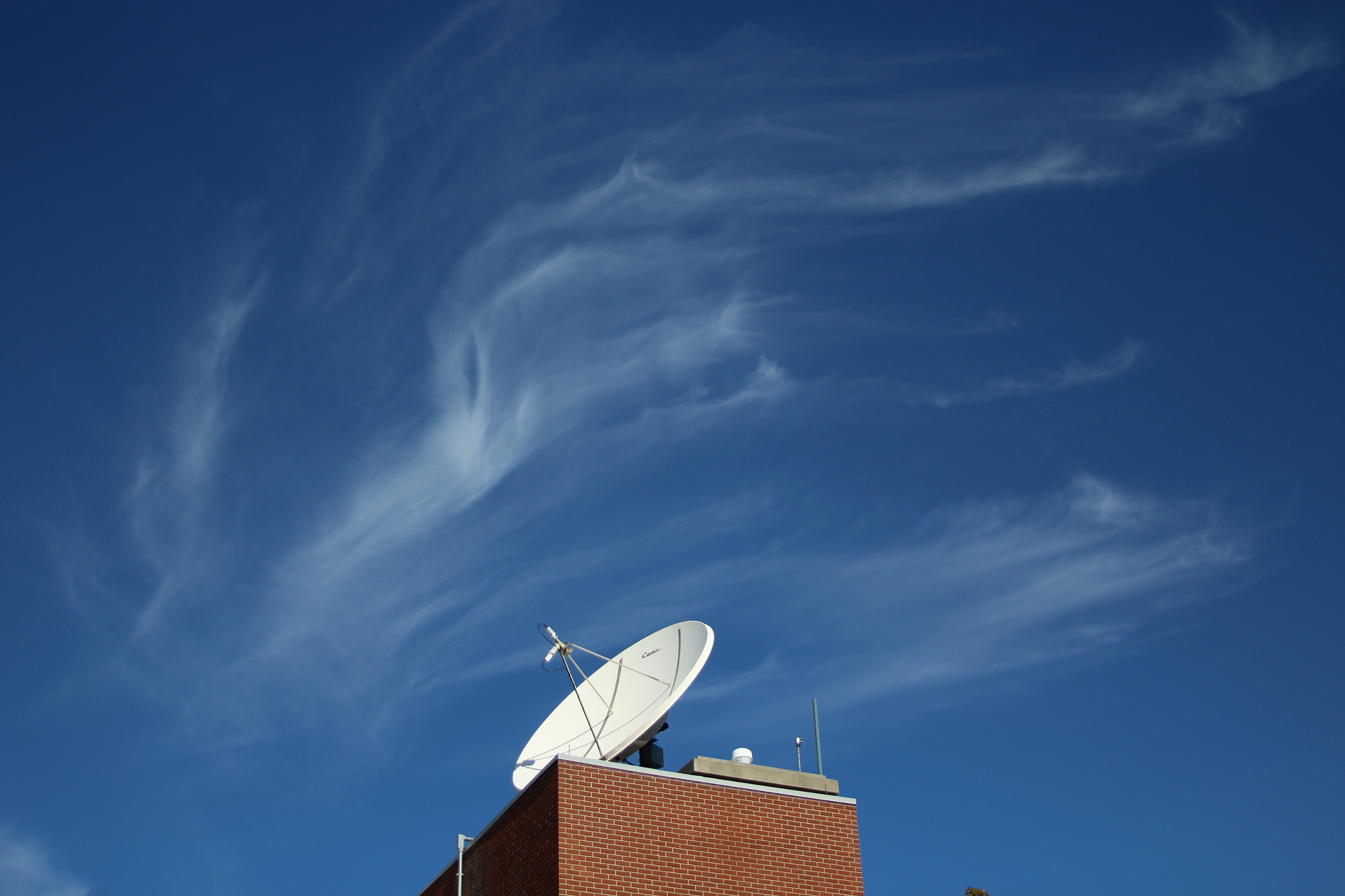 Canon EF 20-35mm f/2.8L sample photo. Wavy cloud photography