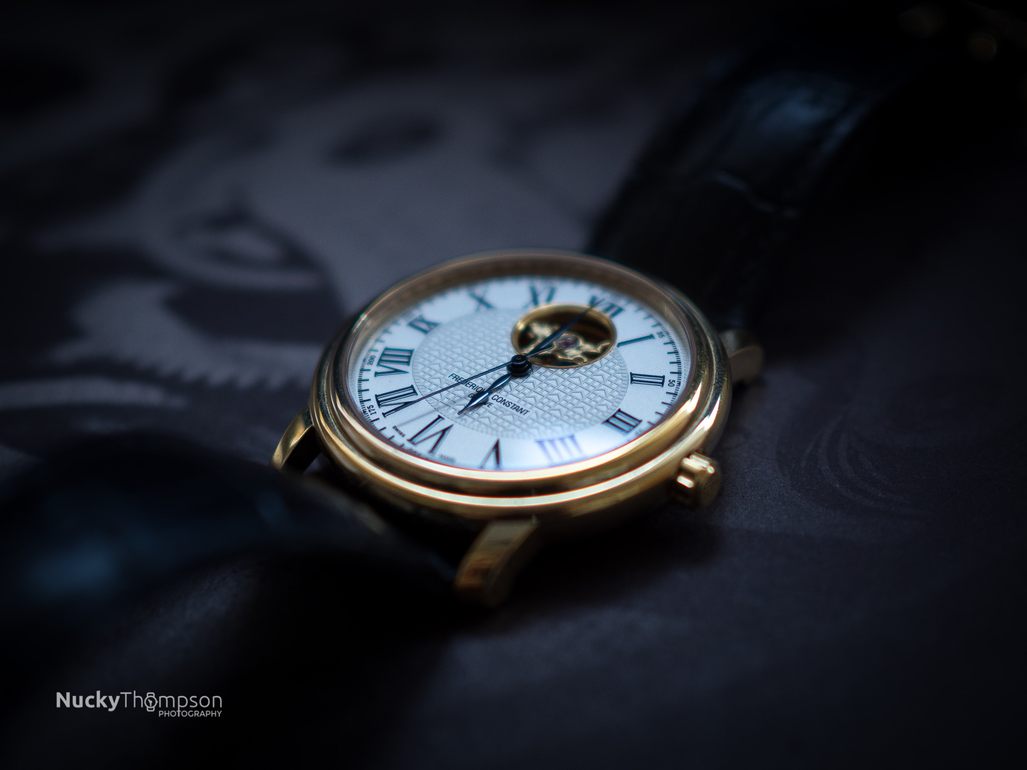 Olympus OM-D E-M10 II + Olympus M.Zuiko Digital 25mm F1.8 sample photo. Frederique constant open heart gold watch photography